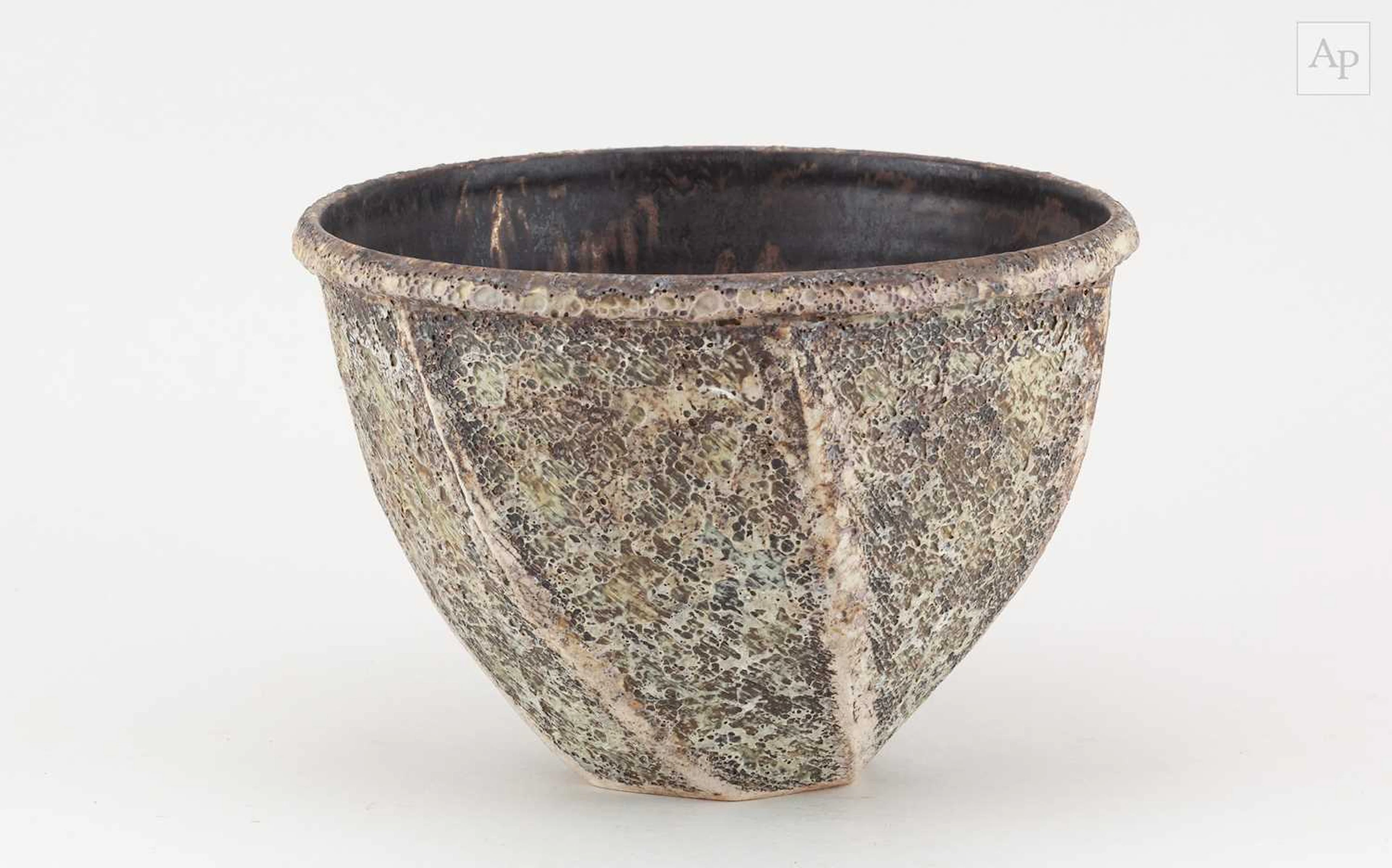 CHRIS CARTER (born 1945); a deep faceted stoneware bowl...