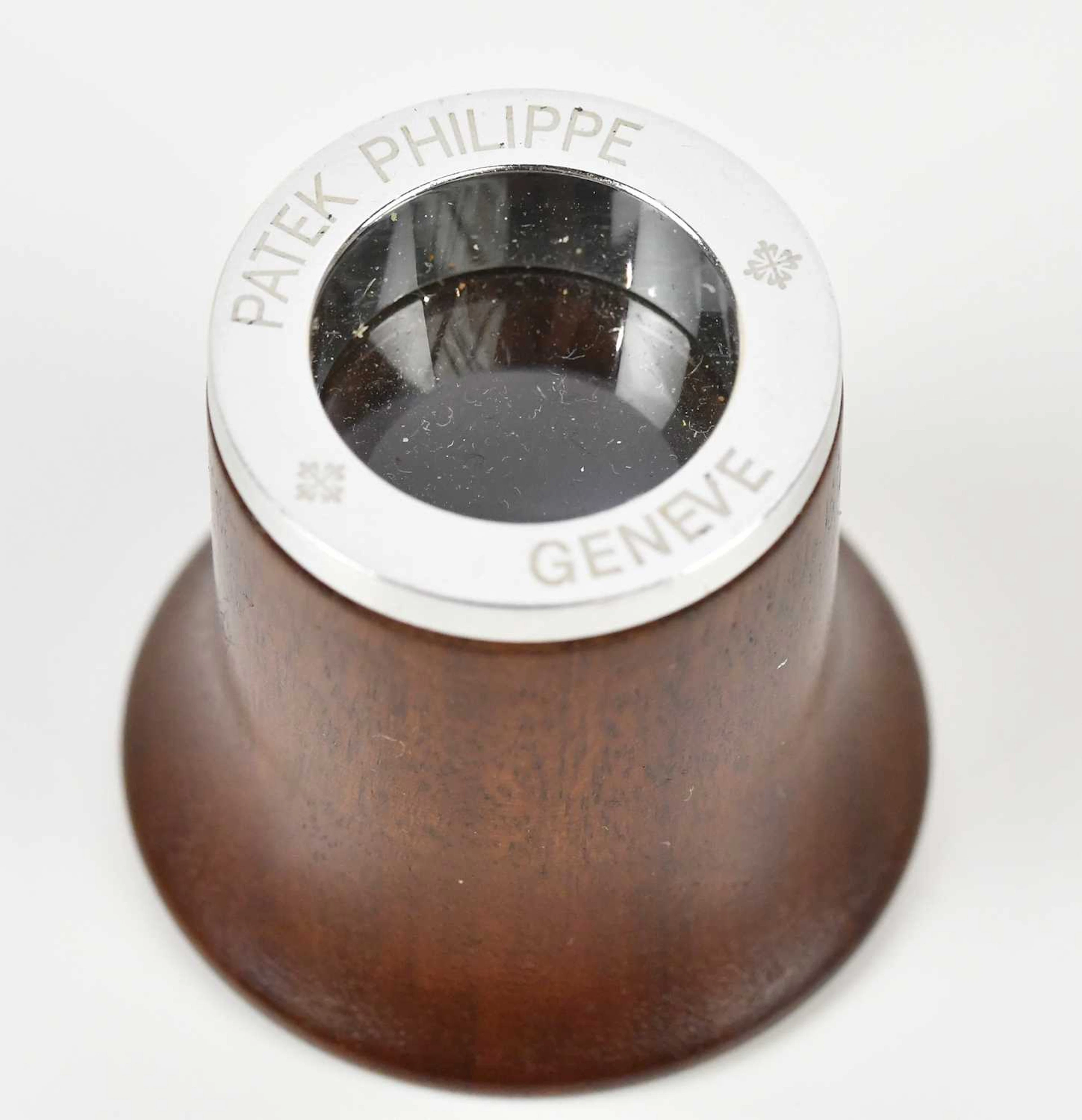 PATEK PHILIPPE; a boxed turned wood and chrome loupe