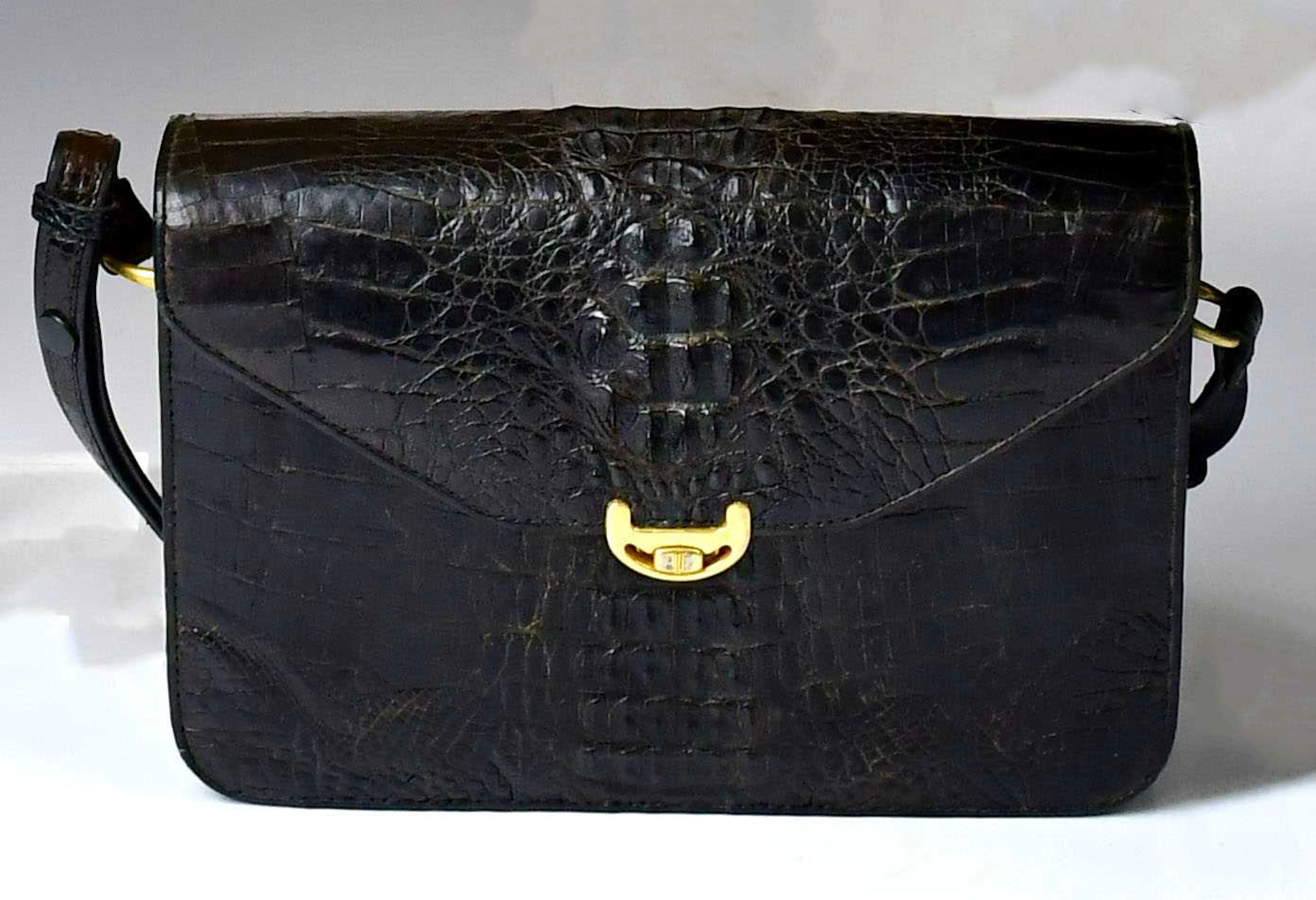 A Finding black crocodile skin handbag