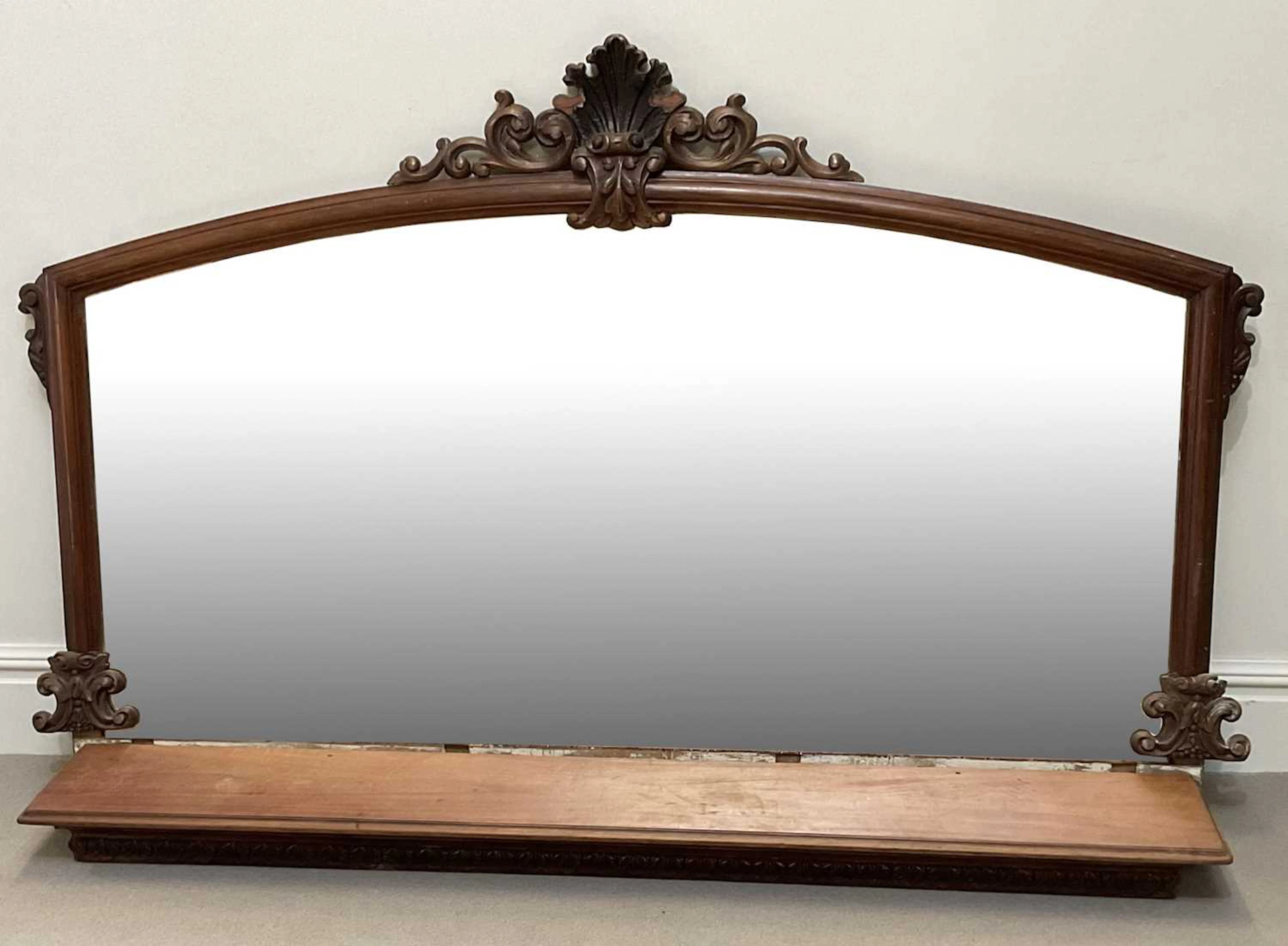 A Victorian carved walnut overmantel mirror (originally...