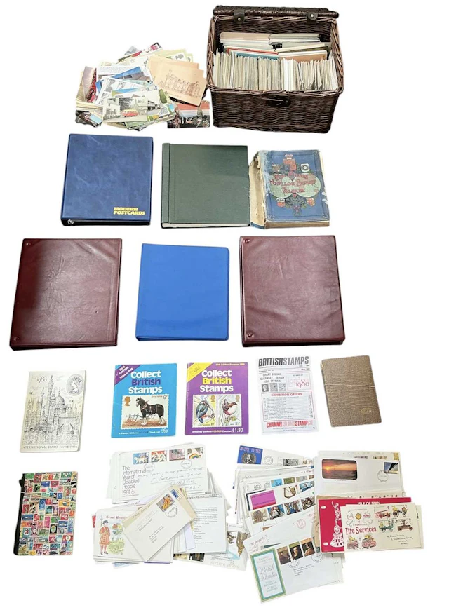 A quantity of assorted all world stamps and postcards