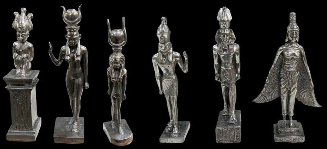 Six assorted Egyptian Revival pewter figures