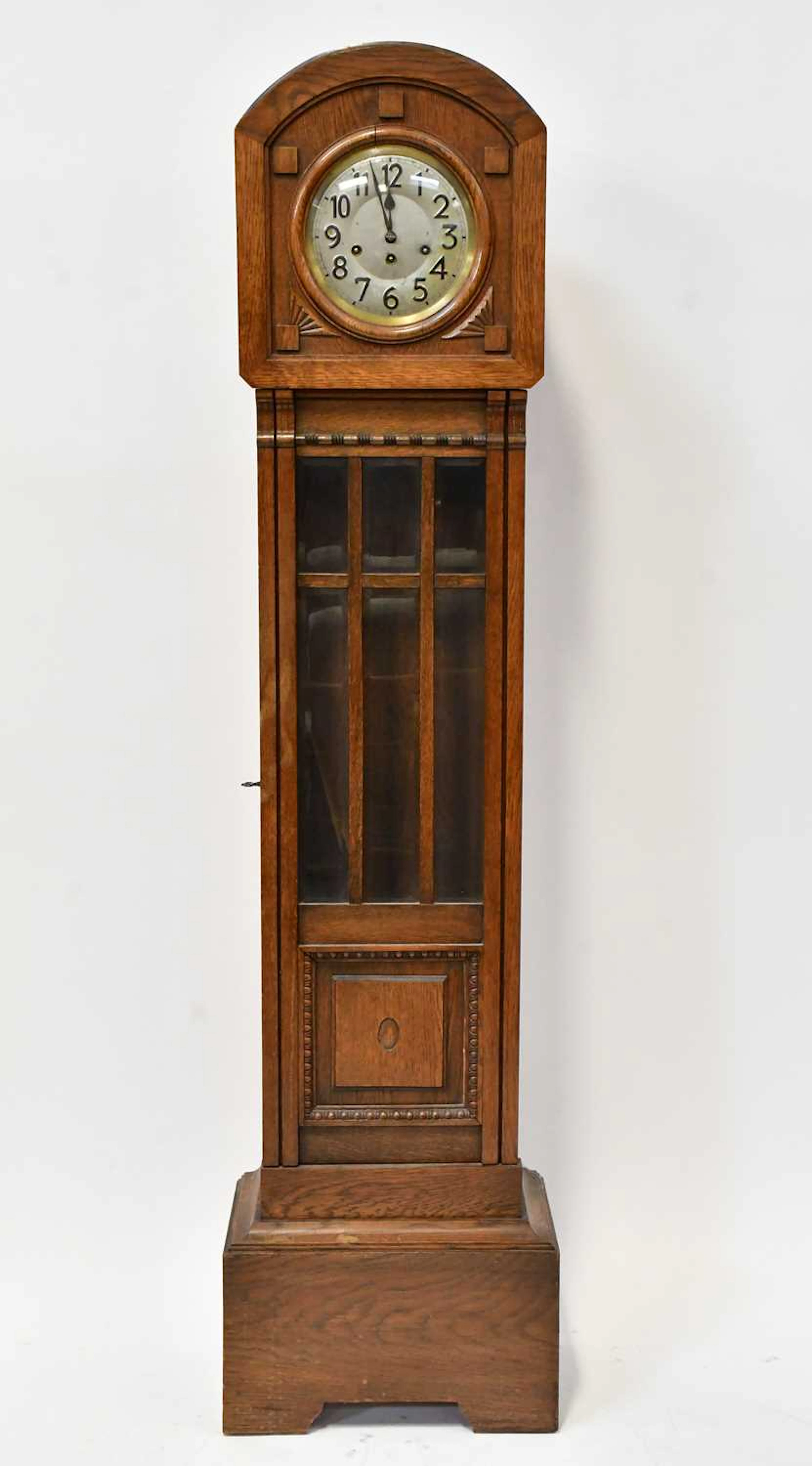 A 1930s oak cased grandmother clock