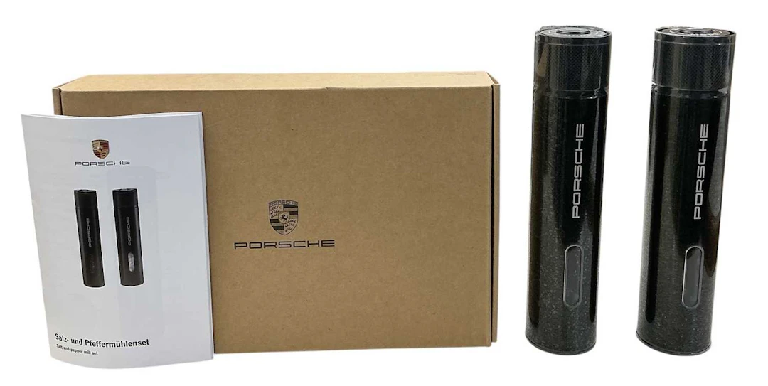 PORSCHE; a cased pair of brand new Porsche Design salt and pepper mills