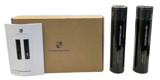 PORSCHE; a cased pair of brand new Porsche Design salt and pepper mills
