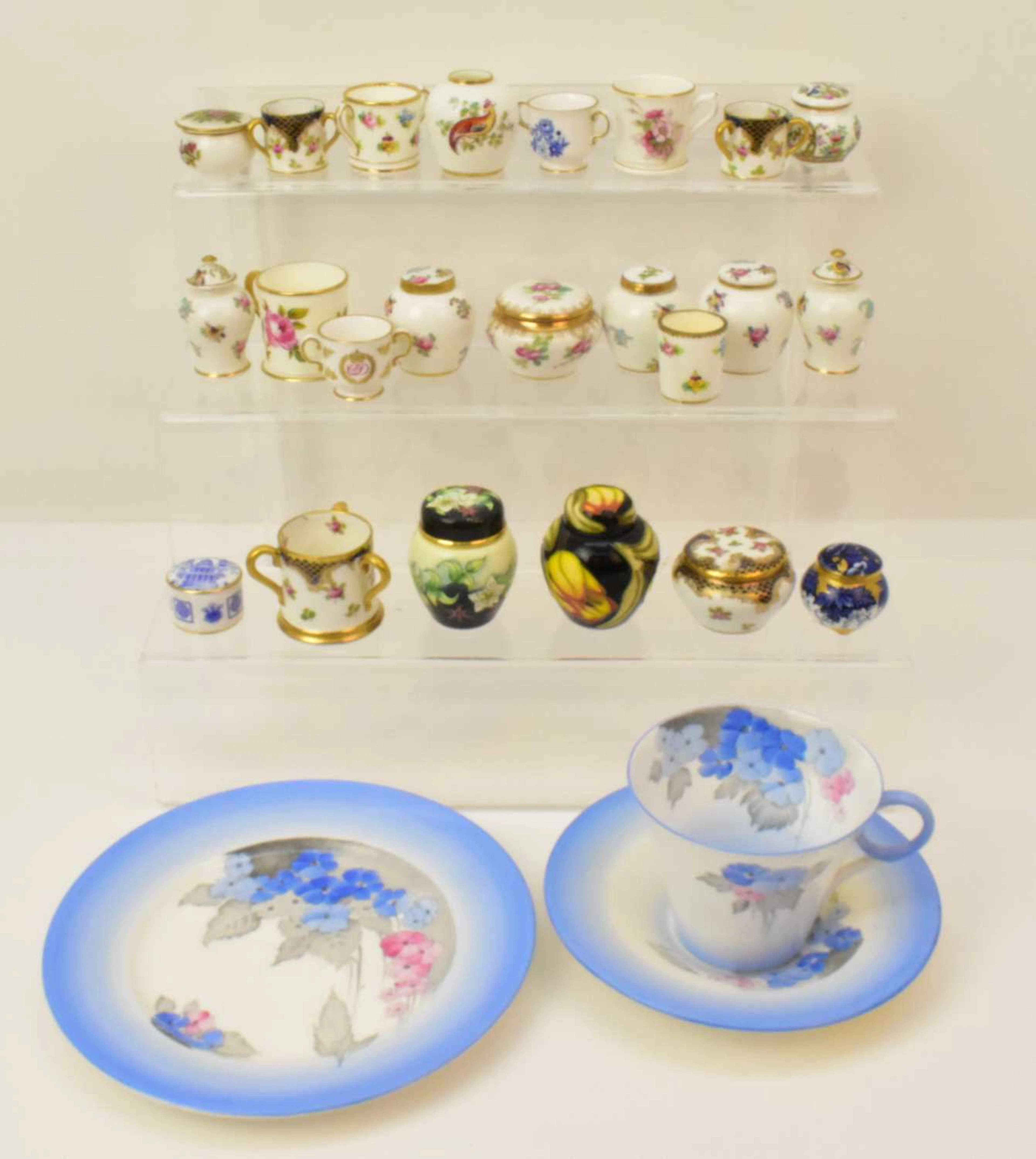 Twenty-six items of porcelain cabinet collectibles...