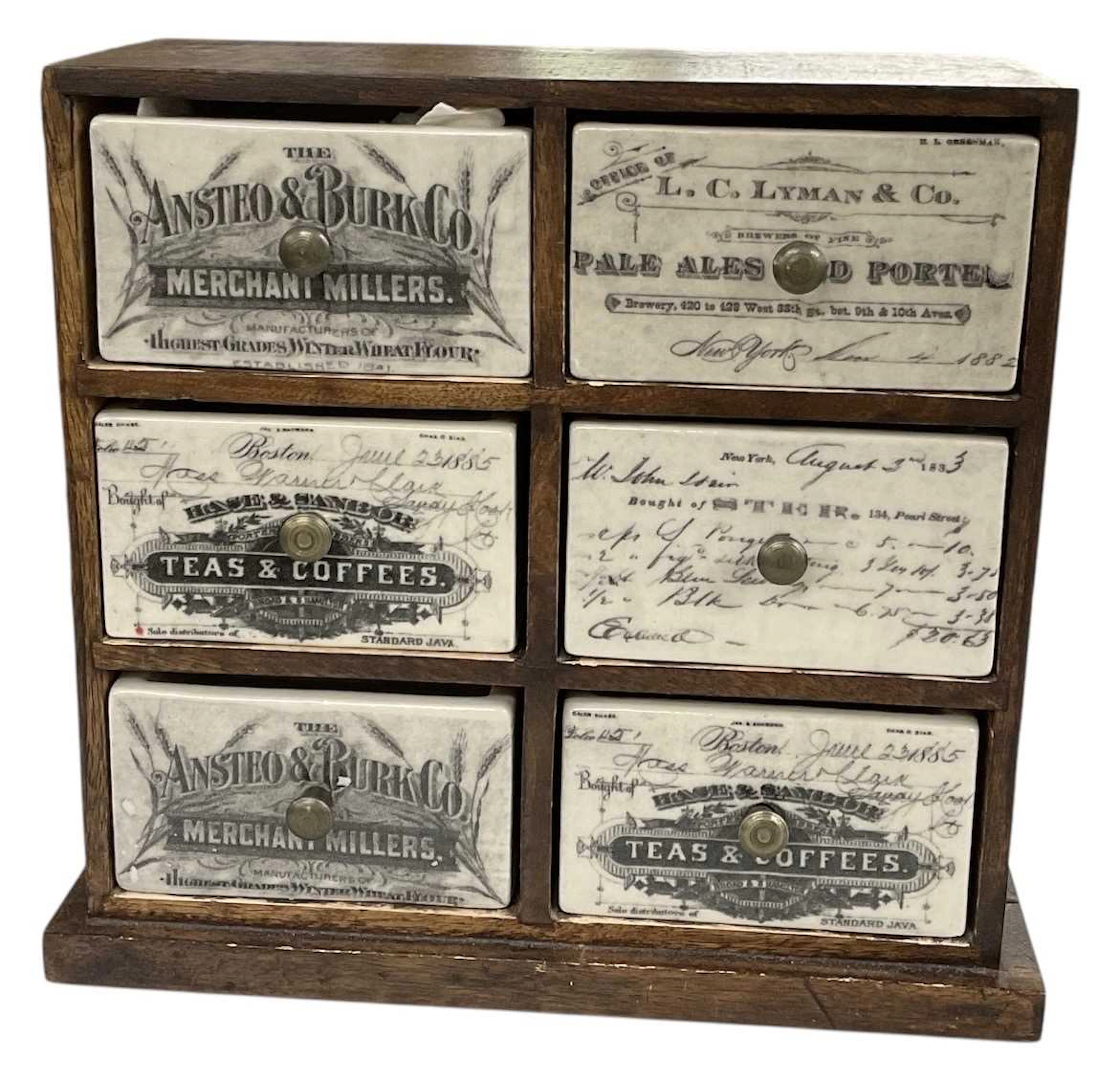 A modern decorative tabletop six drawer apothecary/spice cabinet