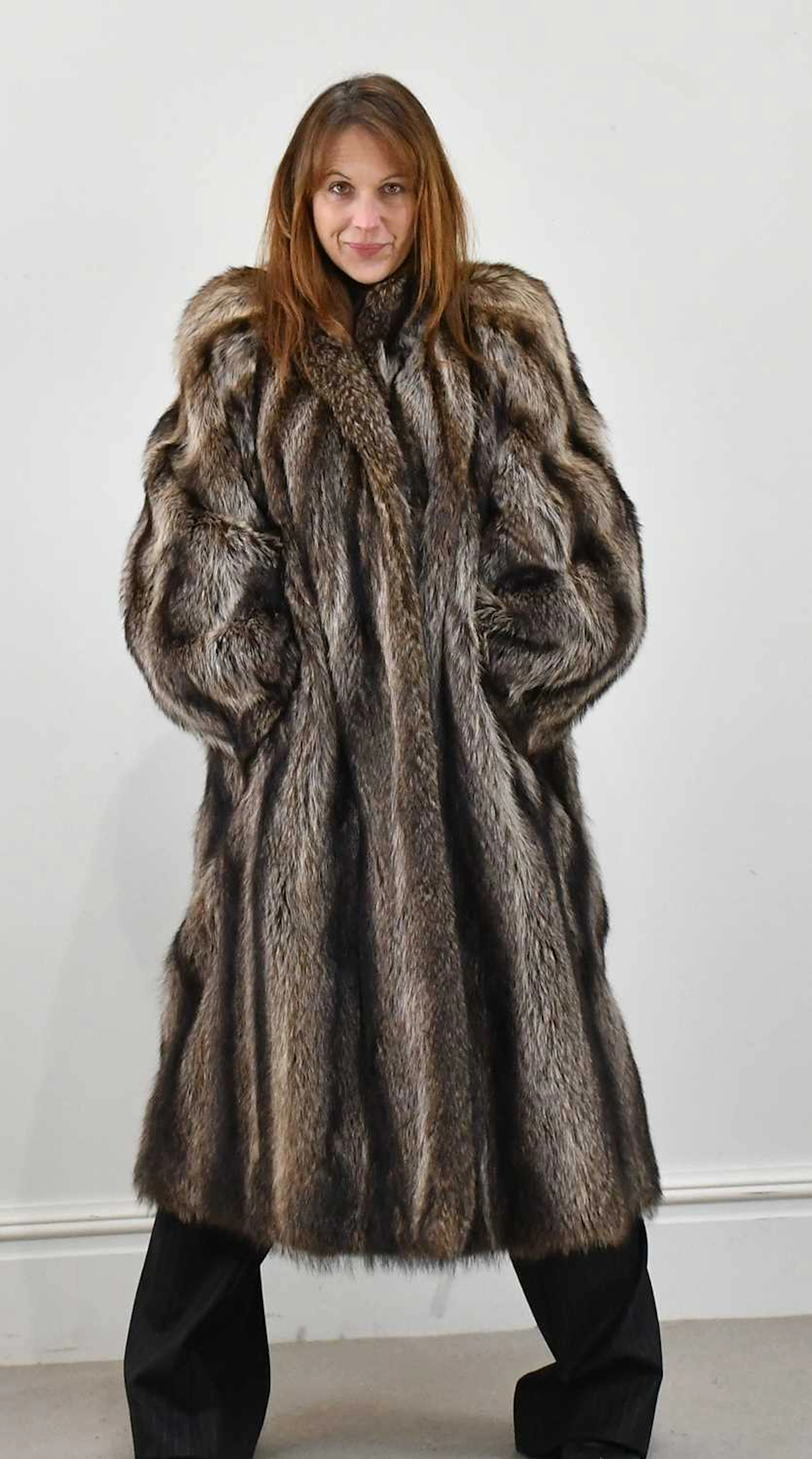 A full-length Canadian racoon fur coat