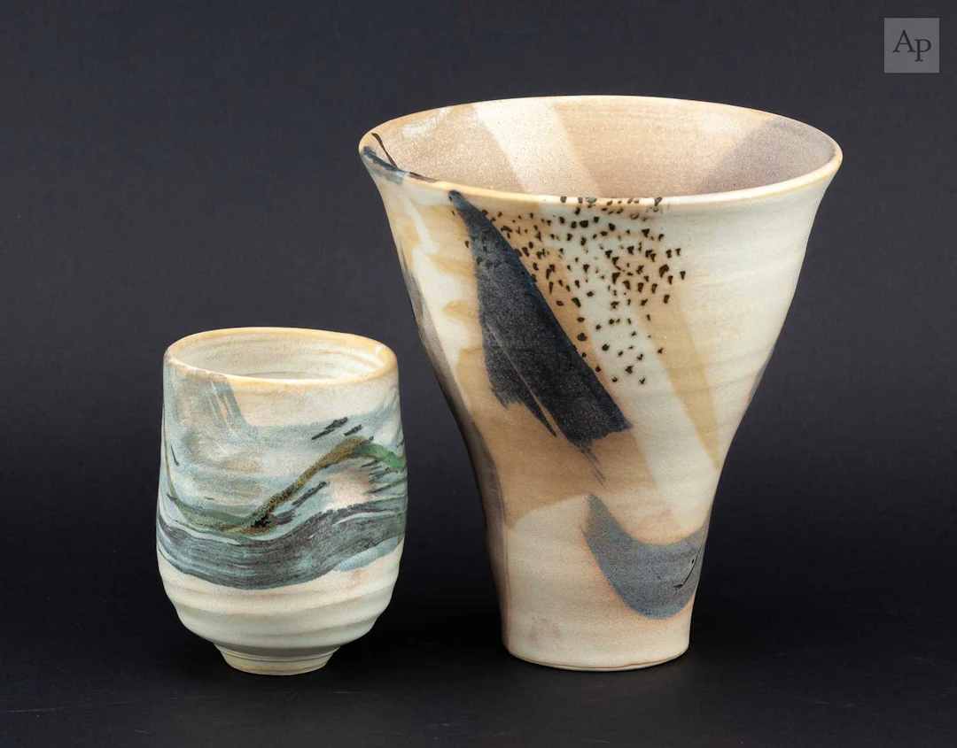 KYRA CANE (born 1962); a stoneware vase of flared form...