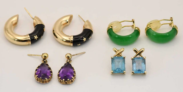 A pair of 14ct yellow gold mounted Chinese green jade half hoop earrings