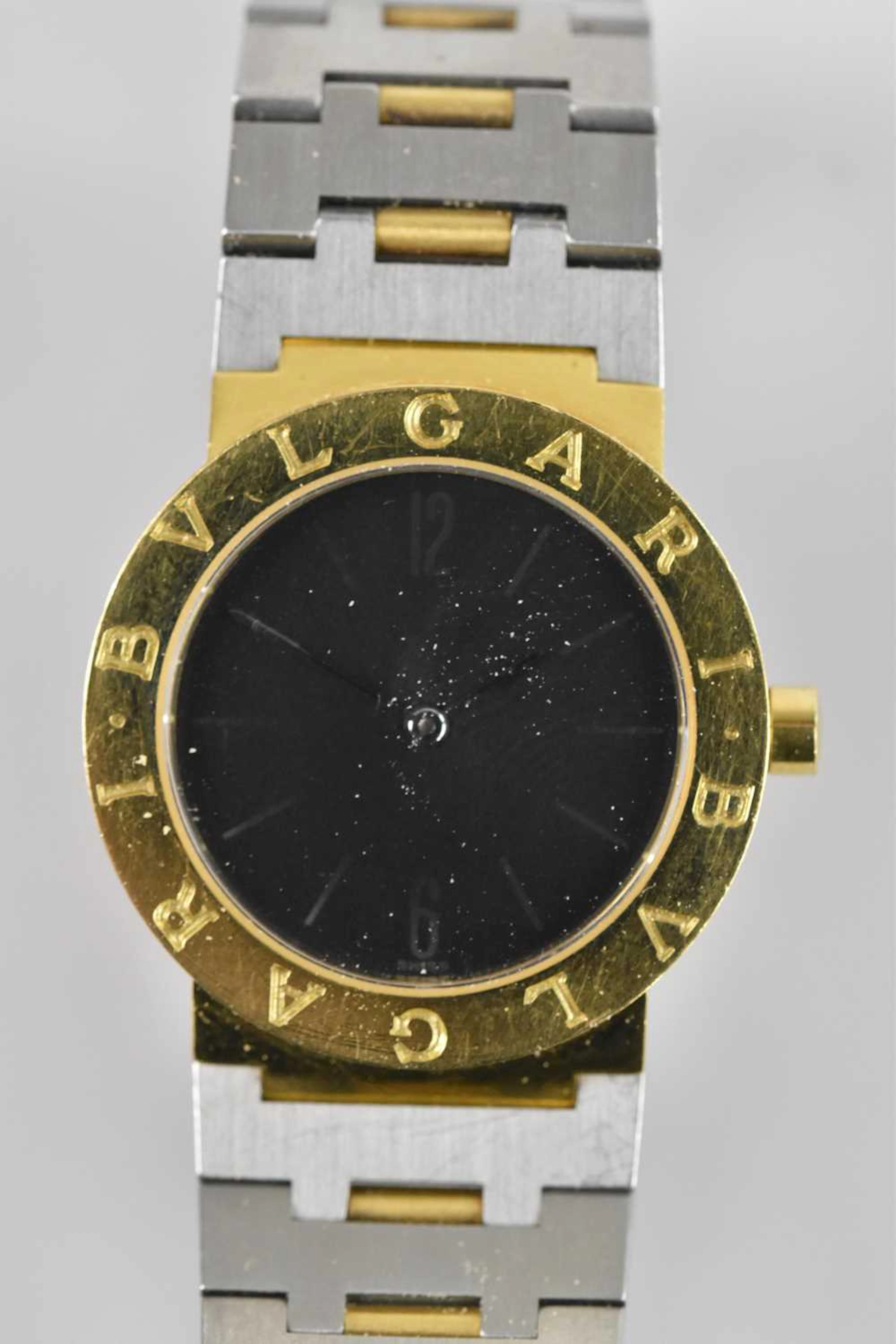 BULGARI BVLGARI; a lady's 18ct gold and stainless steel wristwatch