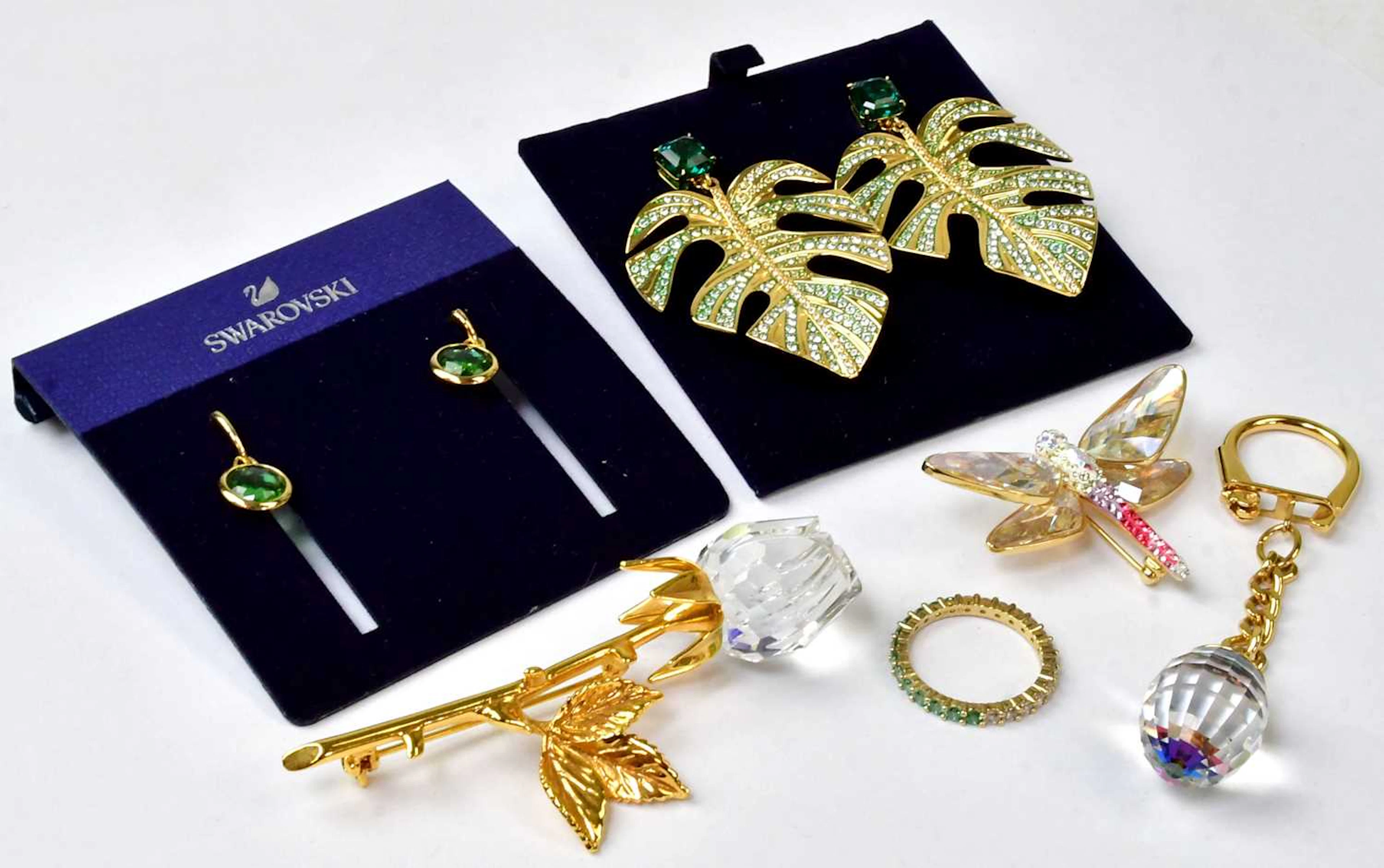 SWAROVSKI; six boxed jewellery items