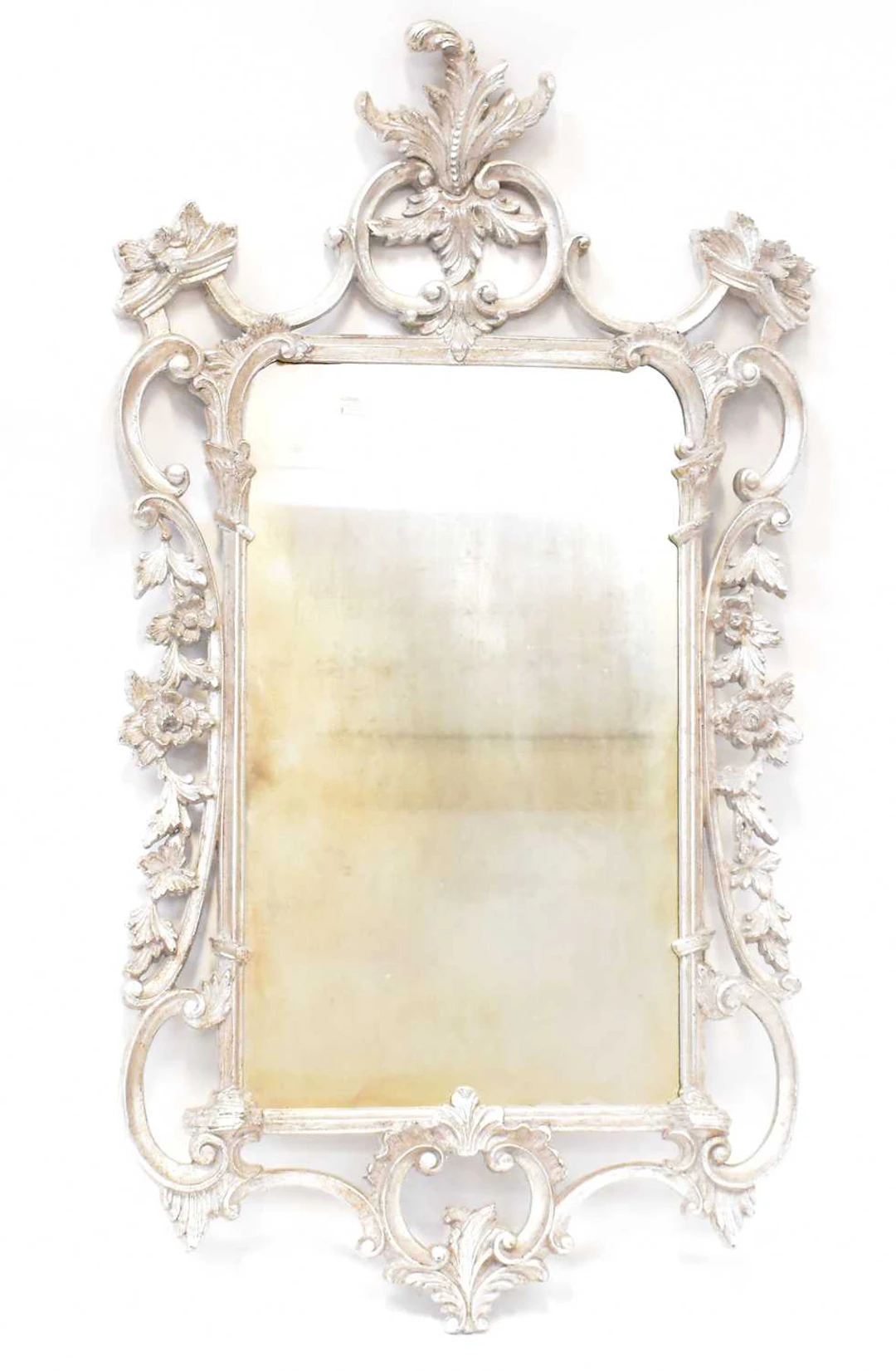 A modern Rococo style silver coloured framed wall hanging mirror