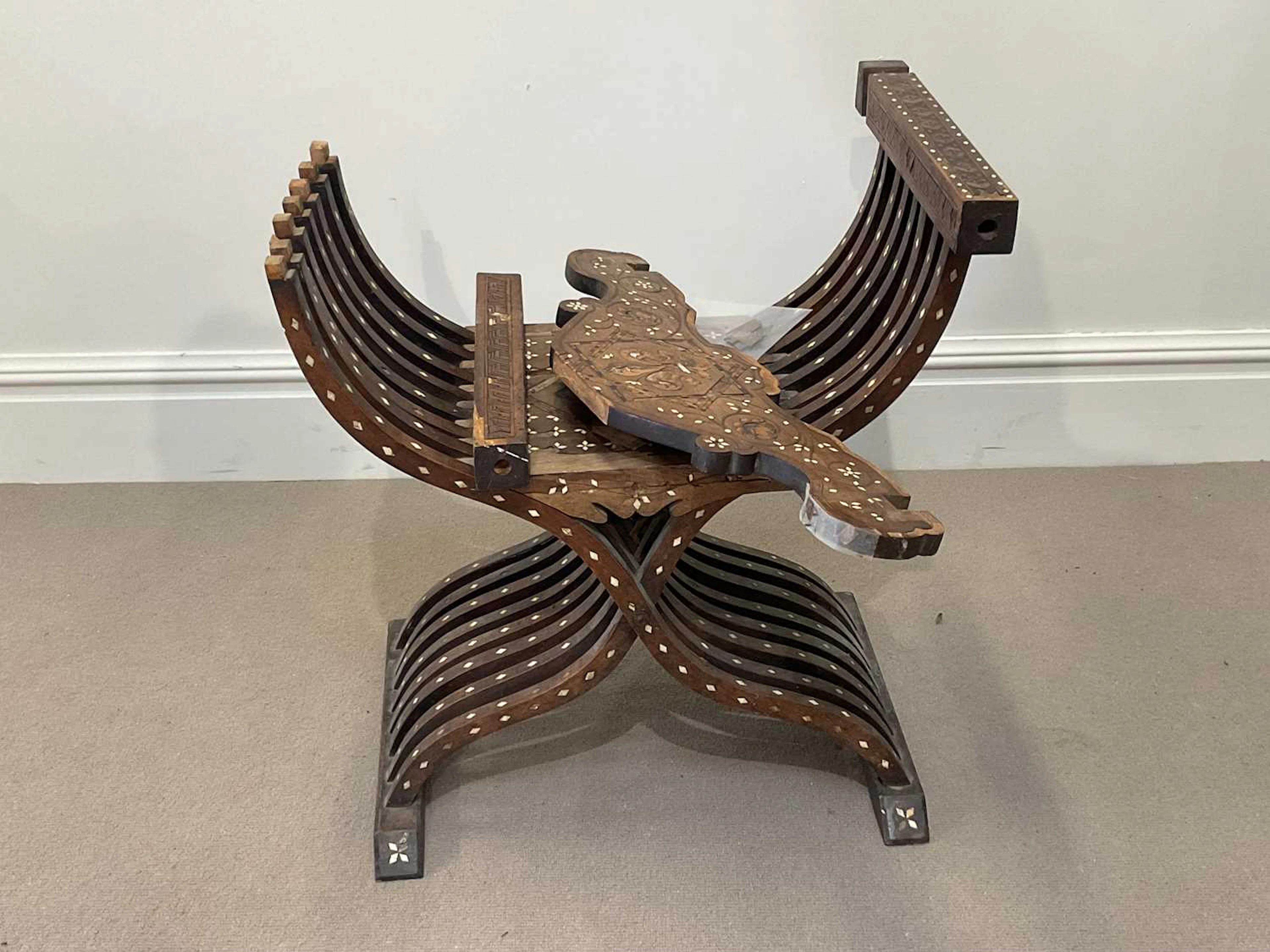 An early 20th century Italian bone and marquetry inlaid...