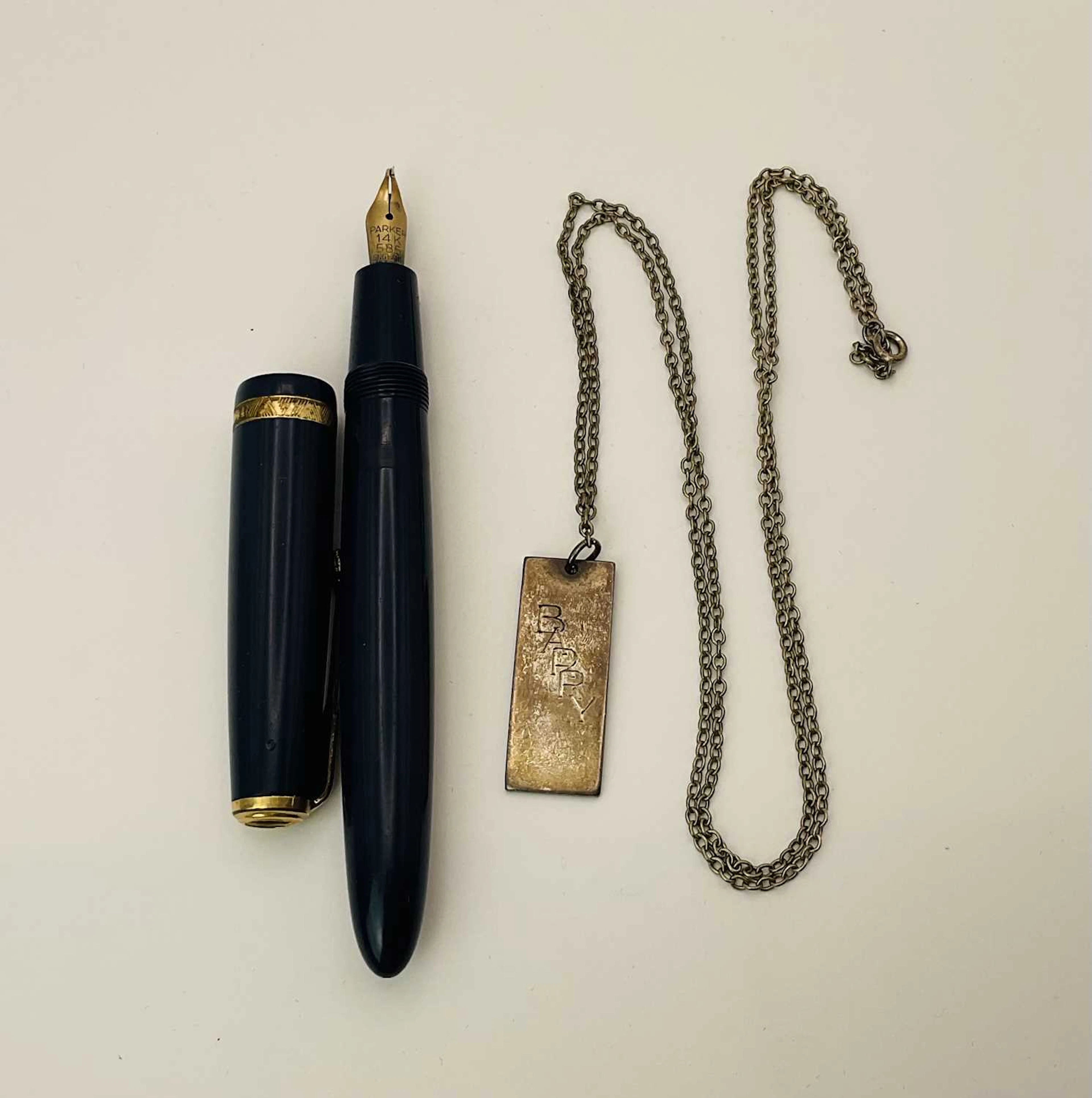 A hallmarked silver pendant and chain