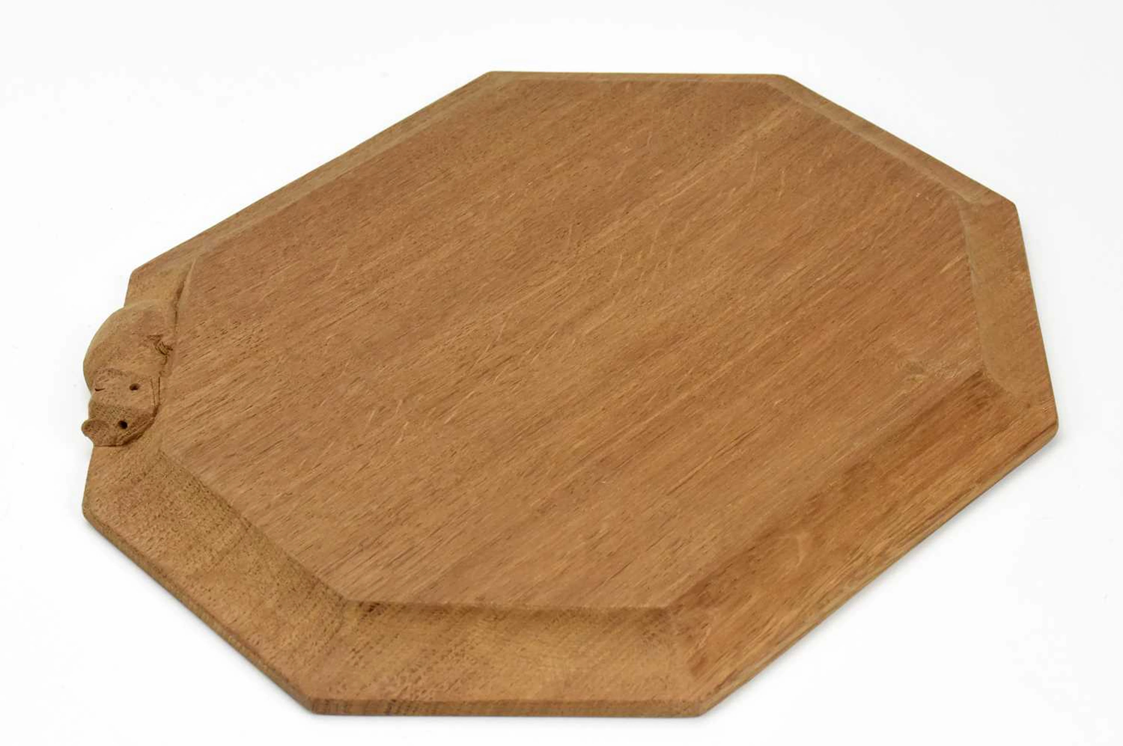WORKSHOP OF ROBERT 'MOUSEMAN' THOMPSON; an oak cheese board