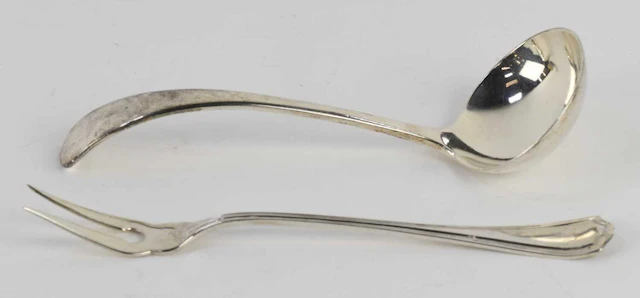 A George V hallmarked silver sauce ladle