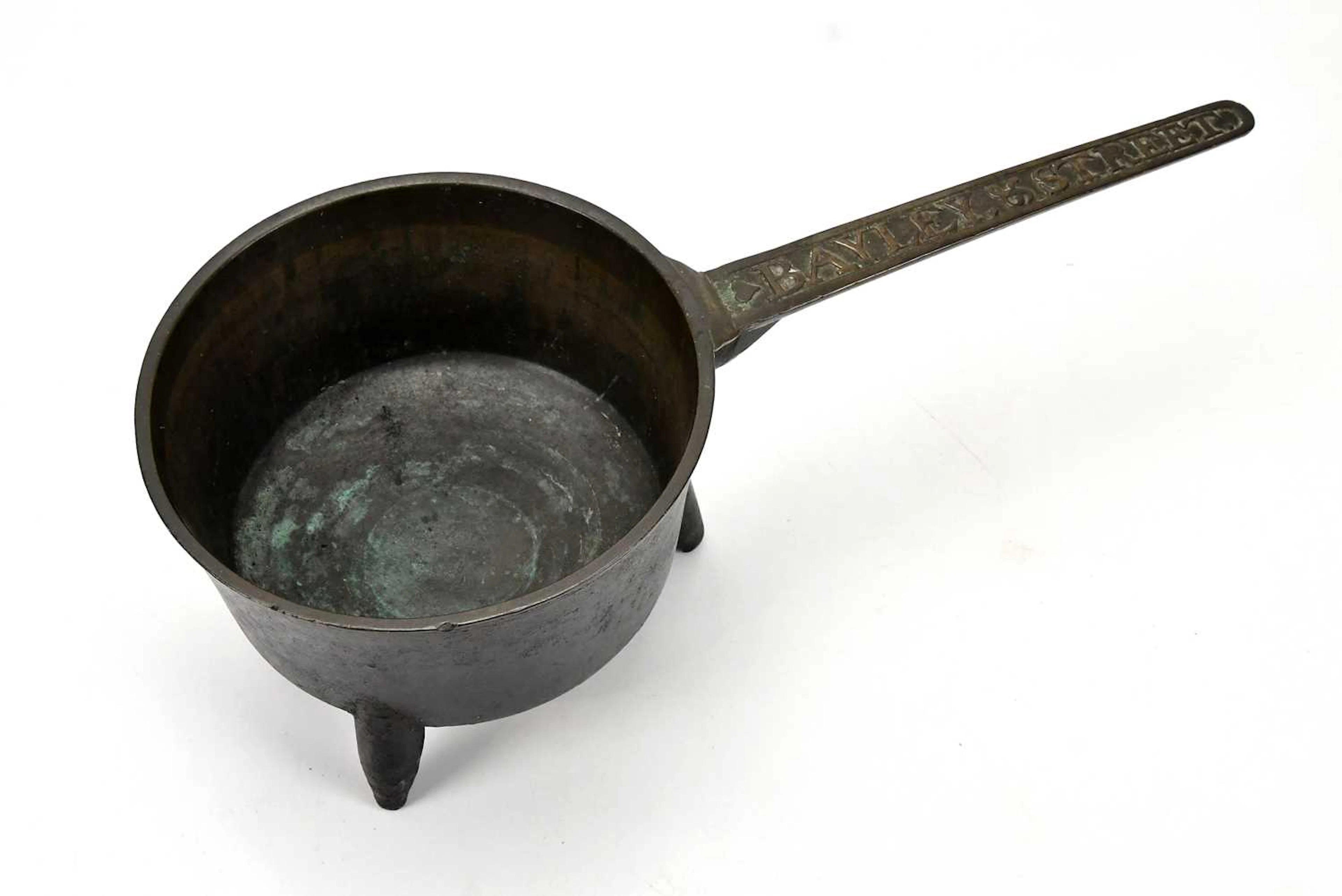 BAYLEY & STREET; a bronze skillet