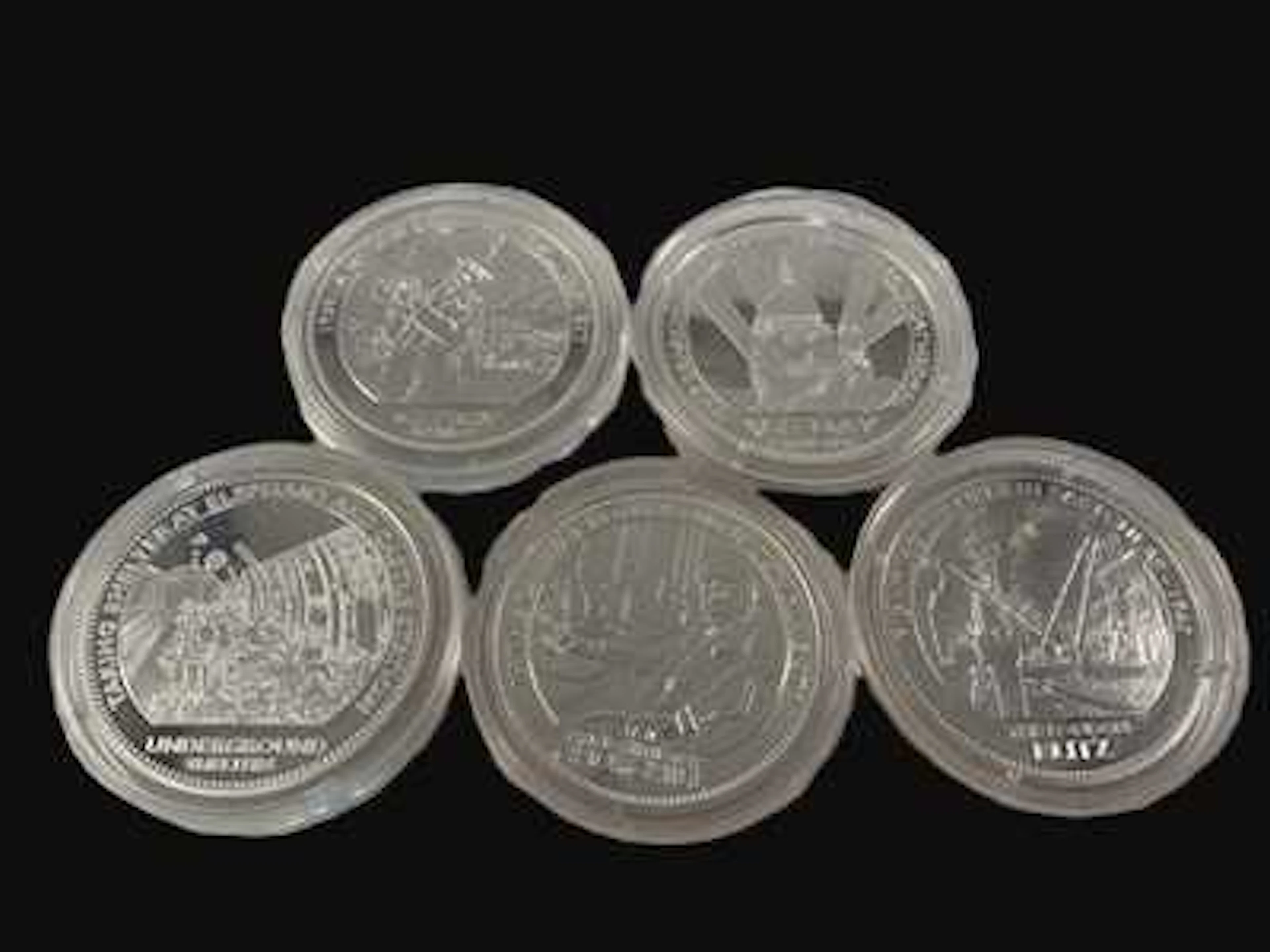 A collection of five 'Memories of Wartime Britain' coins