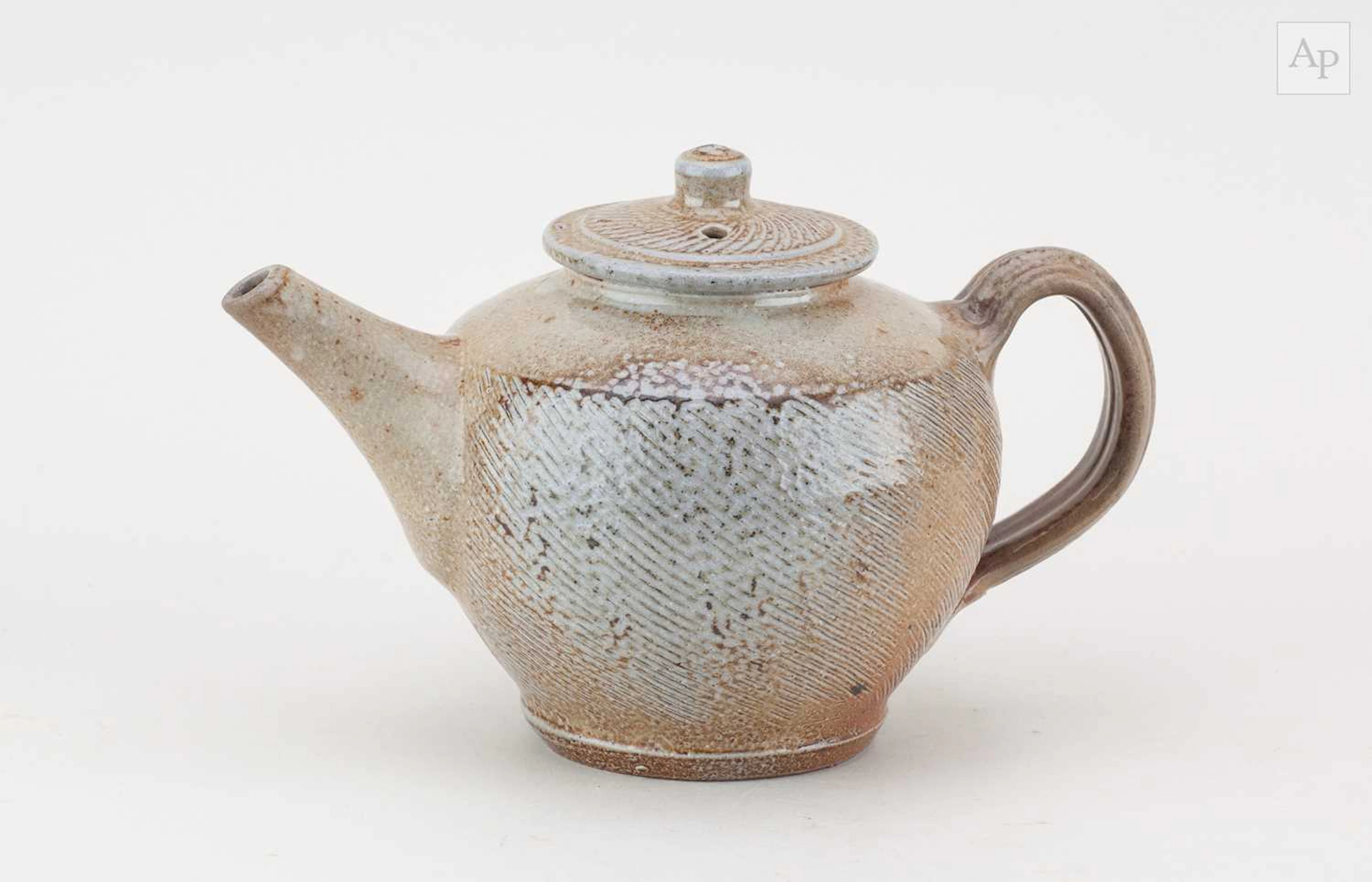 PHIL ROGERS (1951-2020); a salt glazed teapot with incised decoration