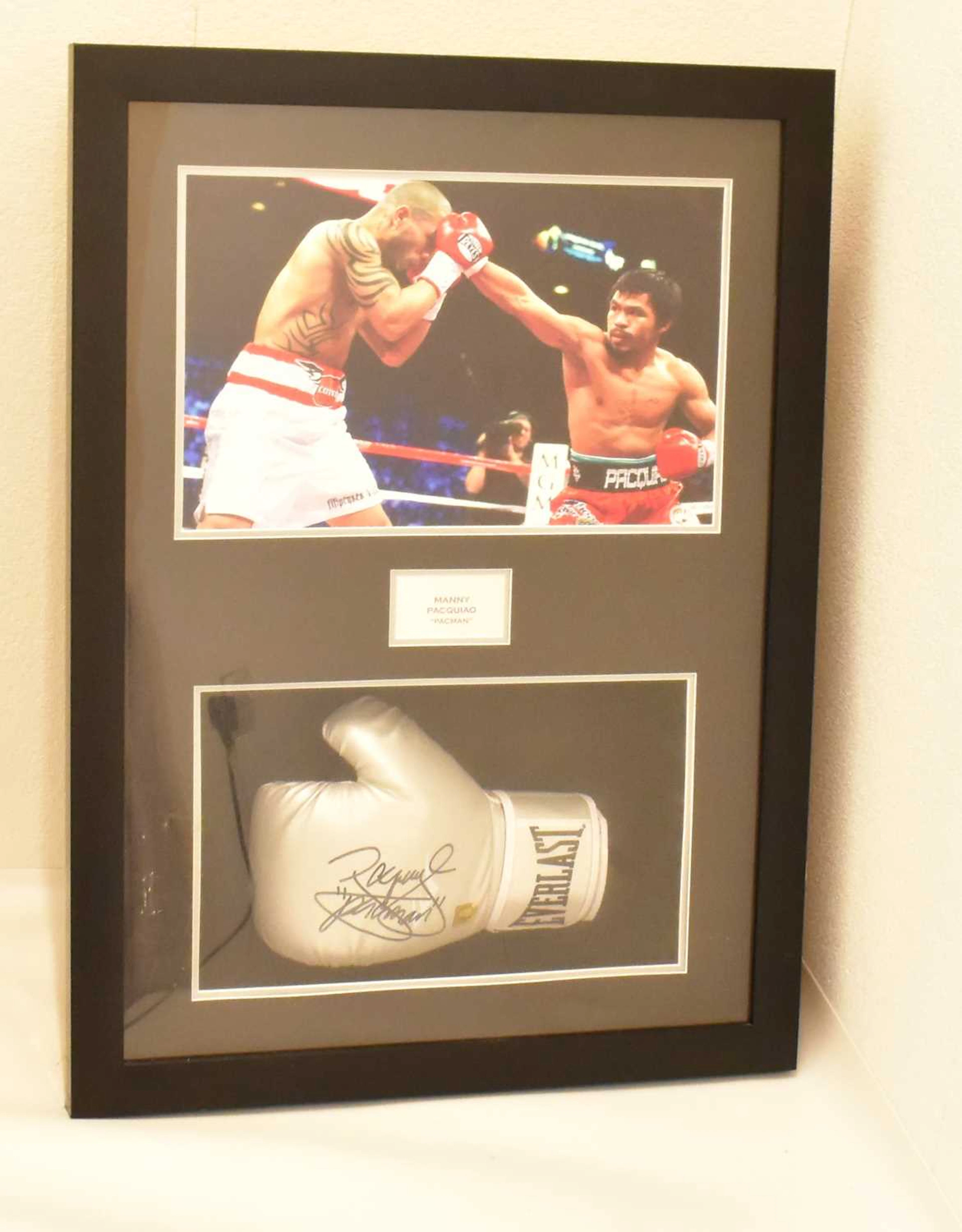MANNY PACQUIAO (PACMAN); a framed display featuring a...