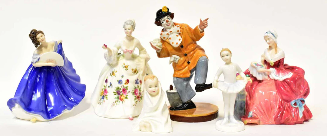 ROYAL DOULTON; six figures comprising 'The Clown'