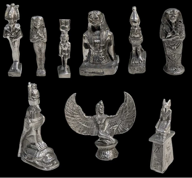 Nine assorted miniature Egyptian Revival pewter figures