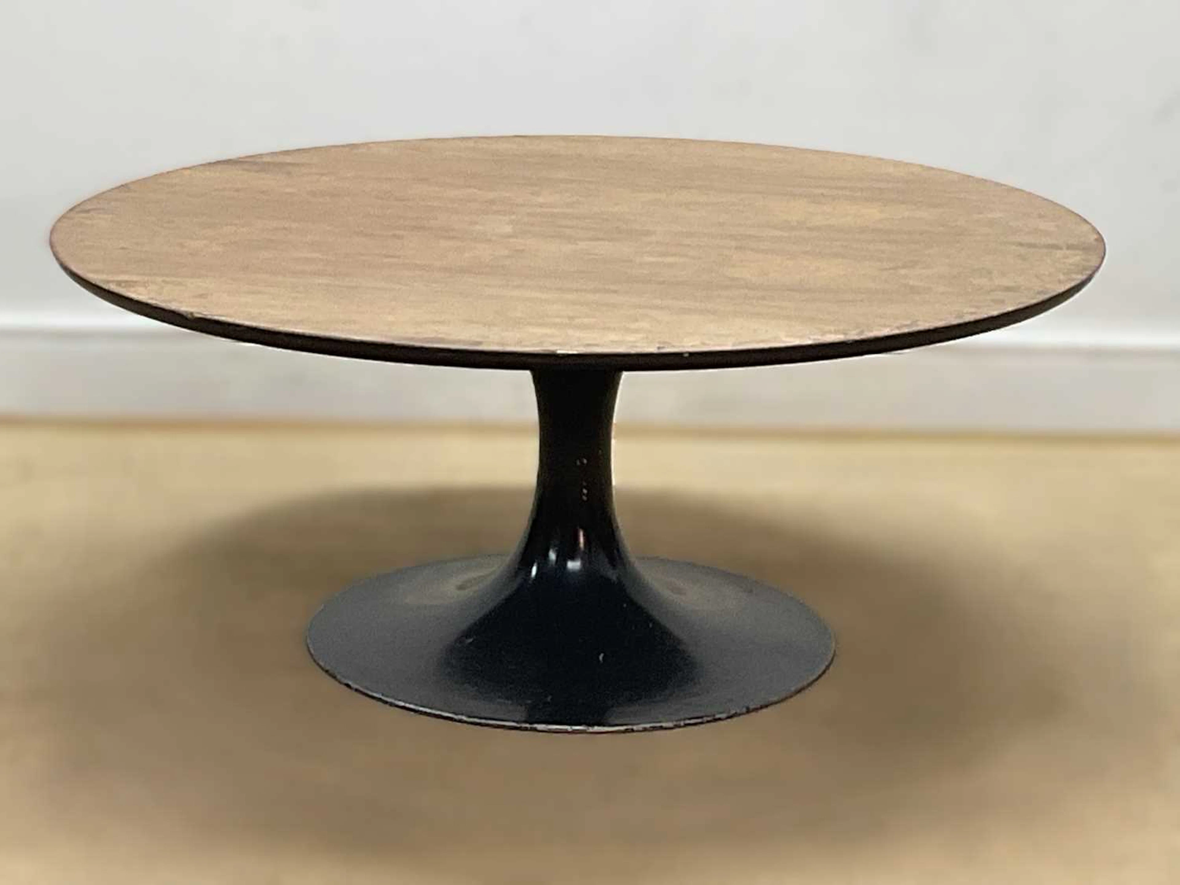 MAURICE BURKE FOR ARKANA; a tulip coffee table with black...