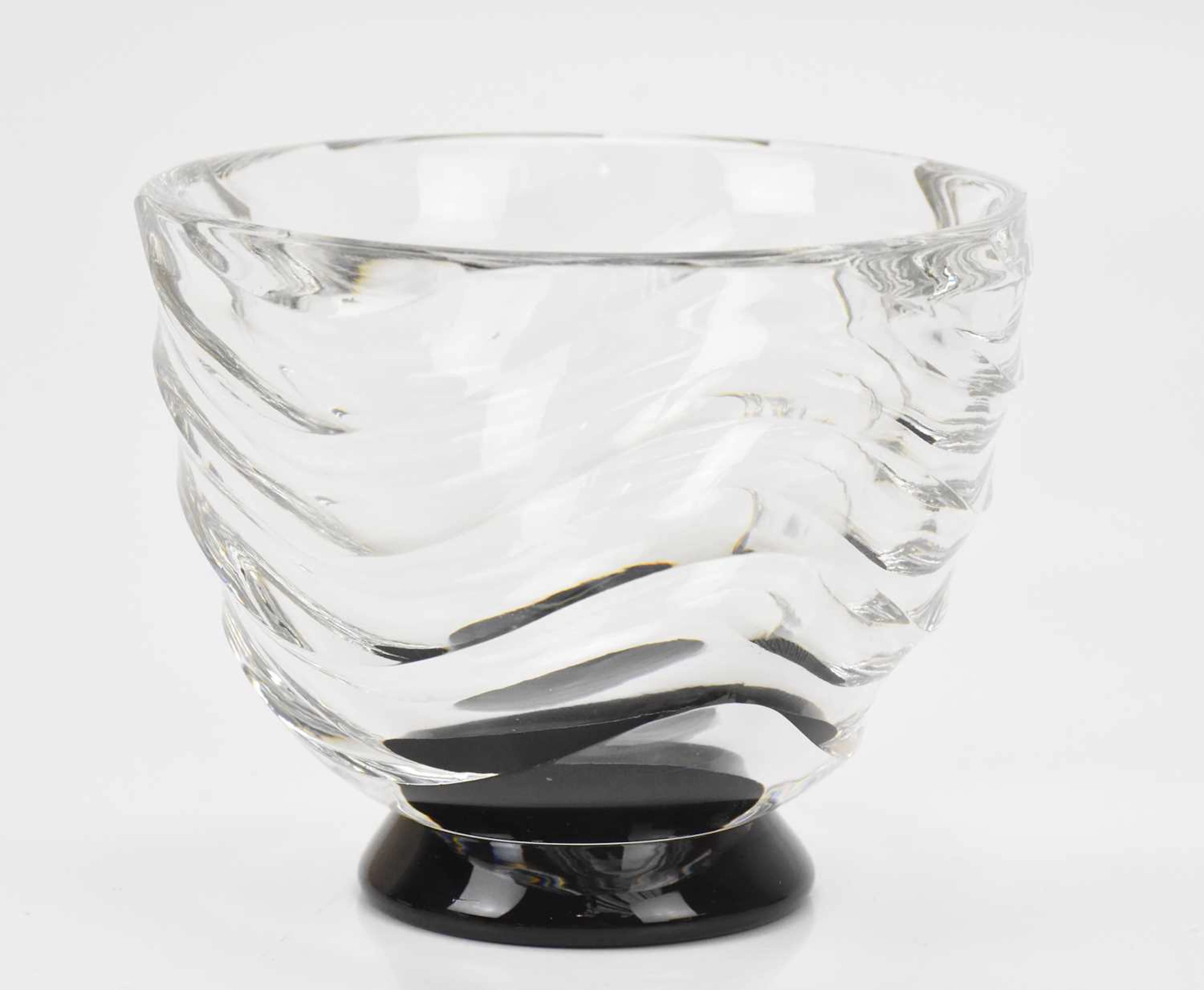 A Scandinavian art glass bowl with fluted wavy detail