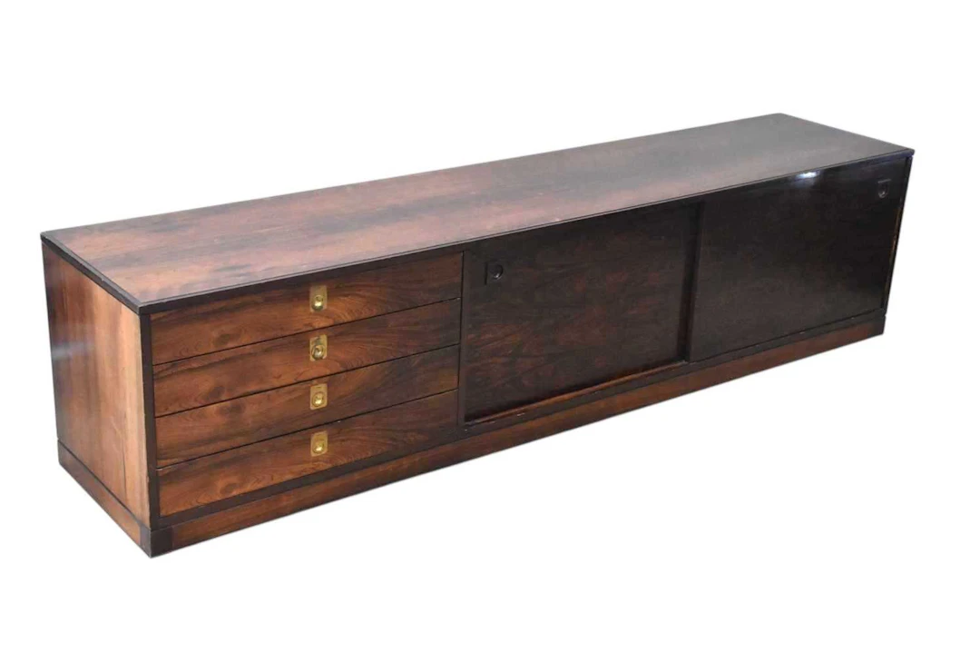 ROBERT HERITAGE FOR ARCHIE SHINE; a rosewood wall hanging sideboard