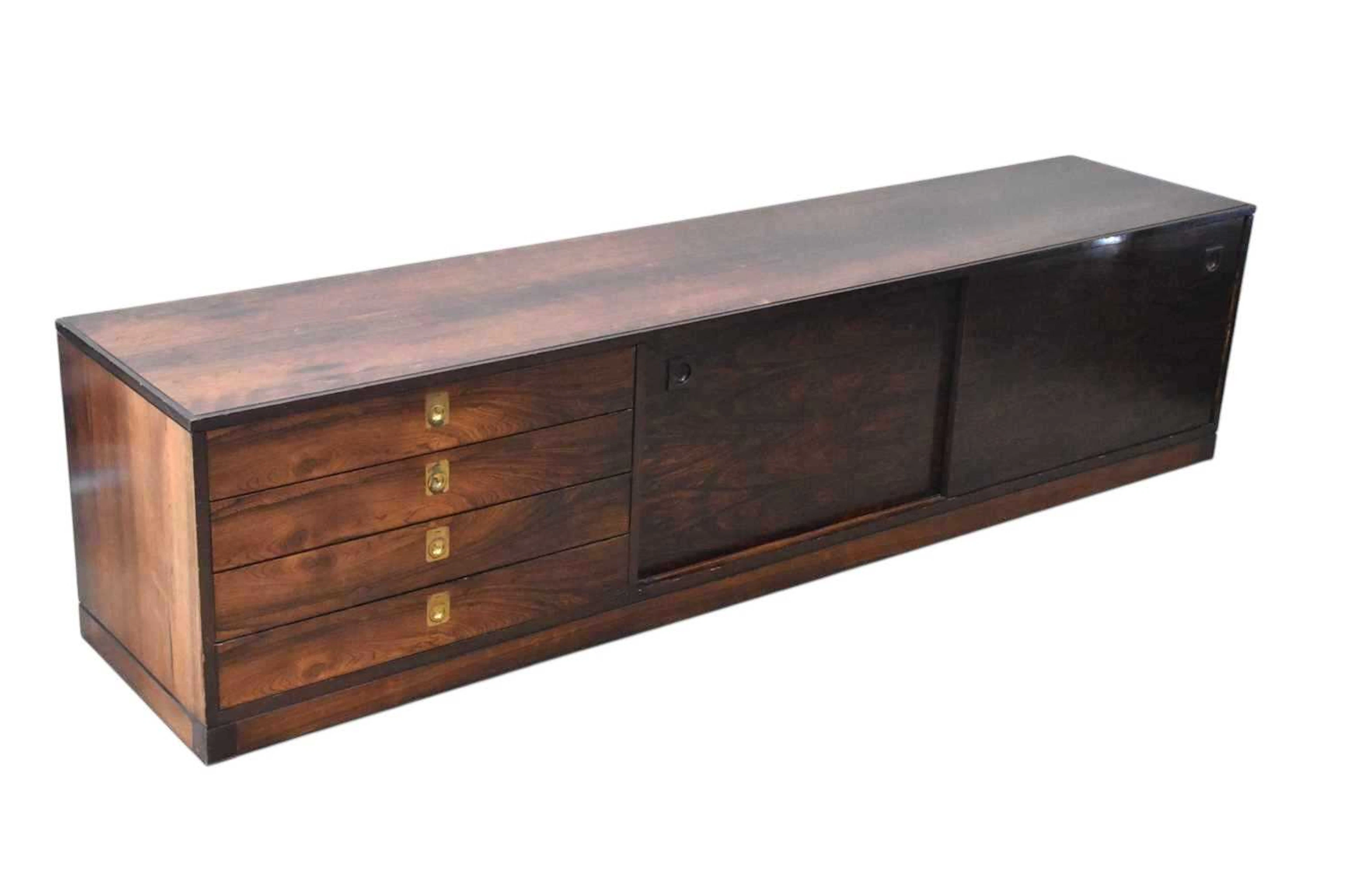 ROBERT HERITAGE FOR ARCHIE SHINE; a rosewood wall hanging sideboard