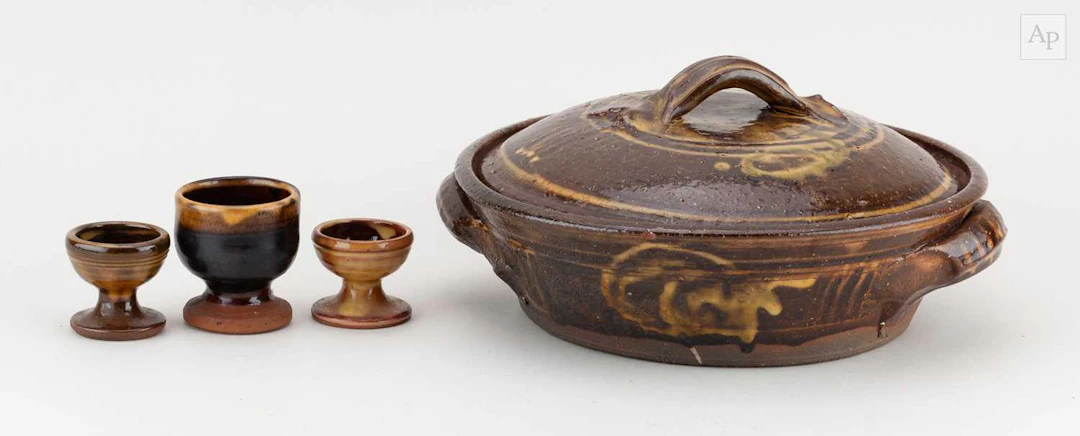 CLIVE BOWEN (born 1943); a slipware casserole with...