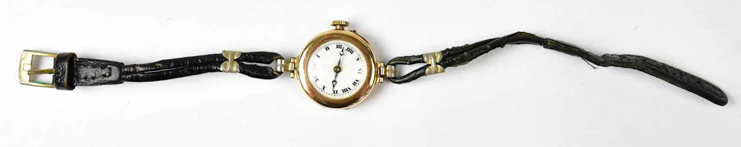 A 9ct yellow gold watch head