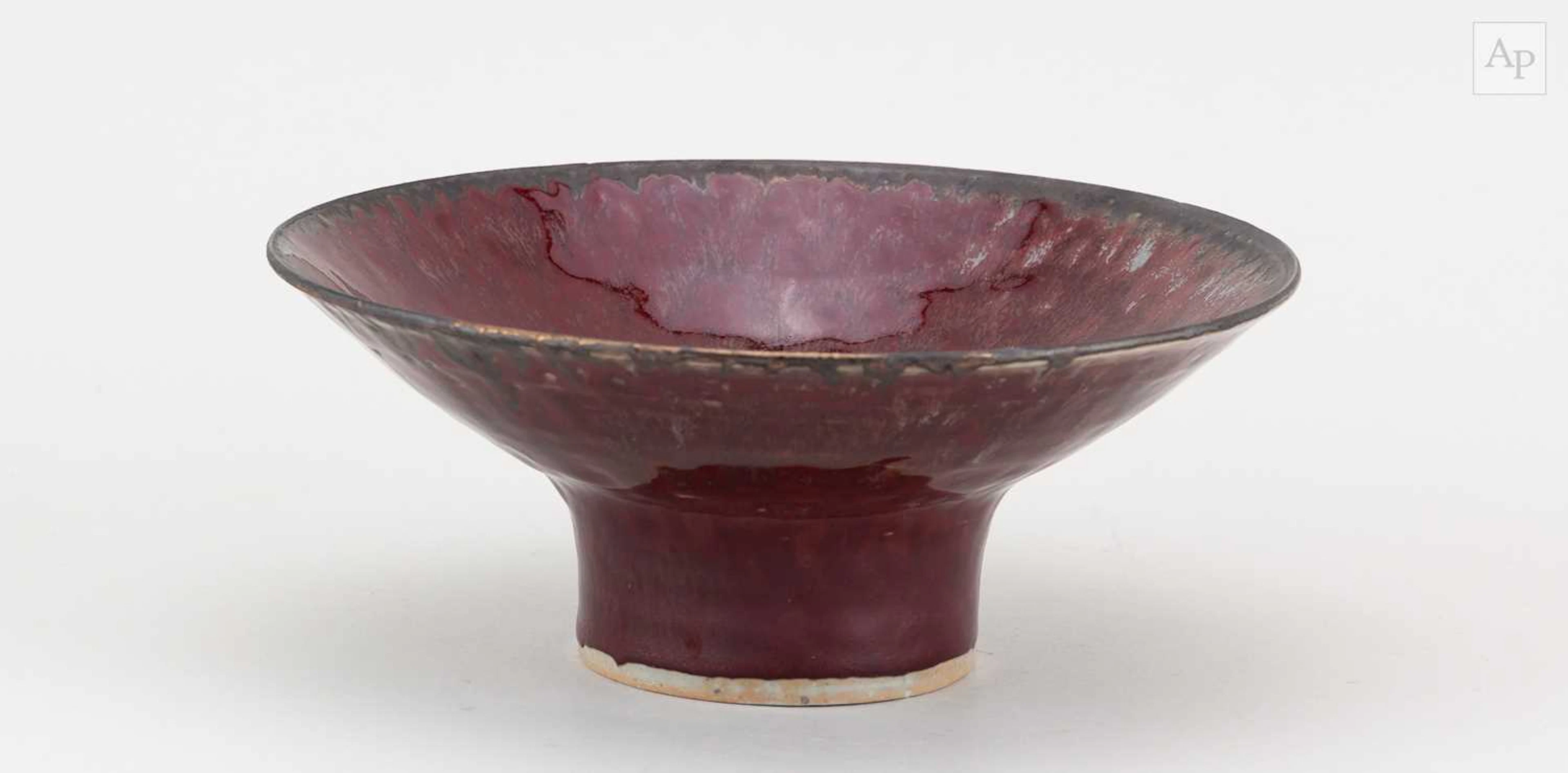 ABDO NAGI (1941-2001); a stoneware dish partially covered...