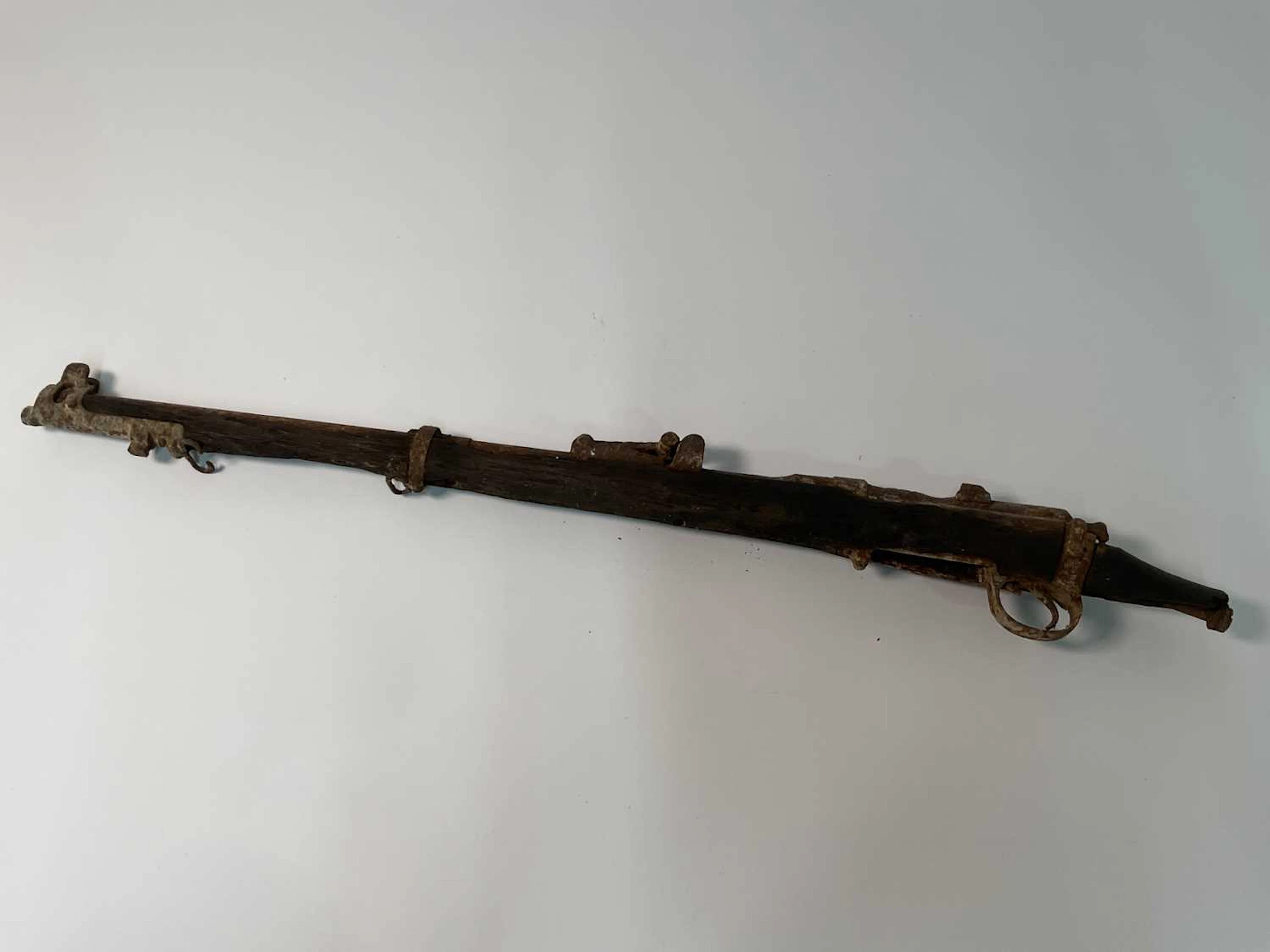 The remnants of a British WWII rifle