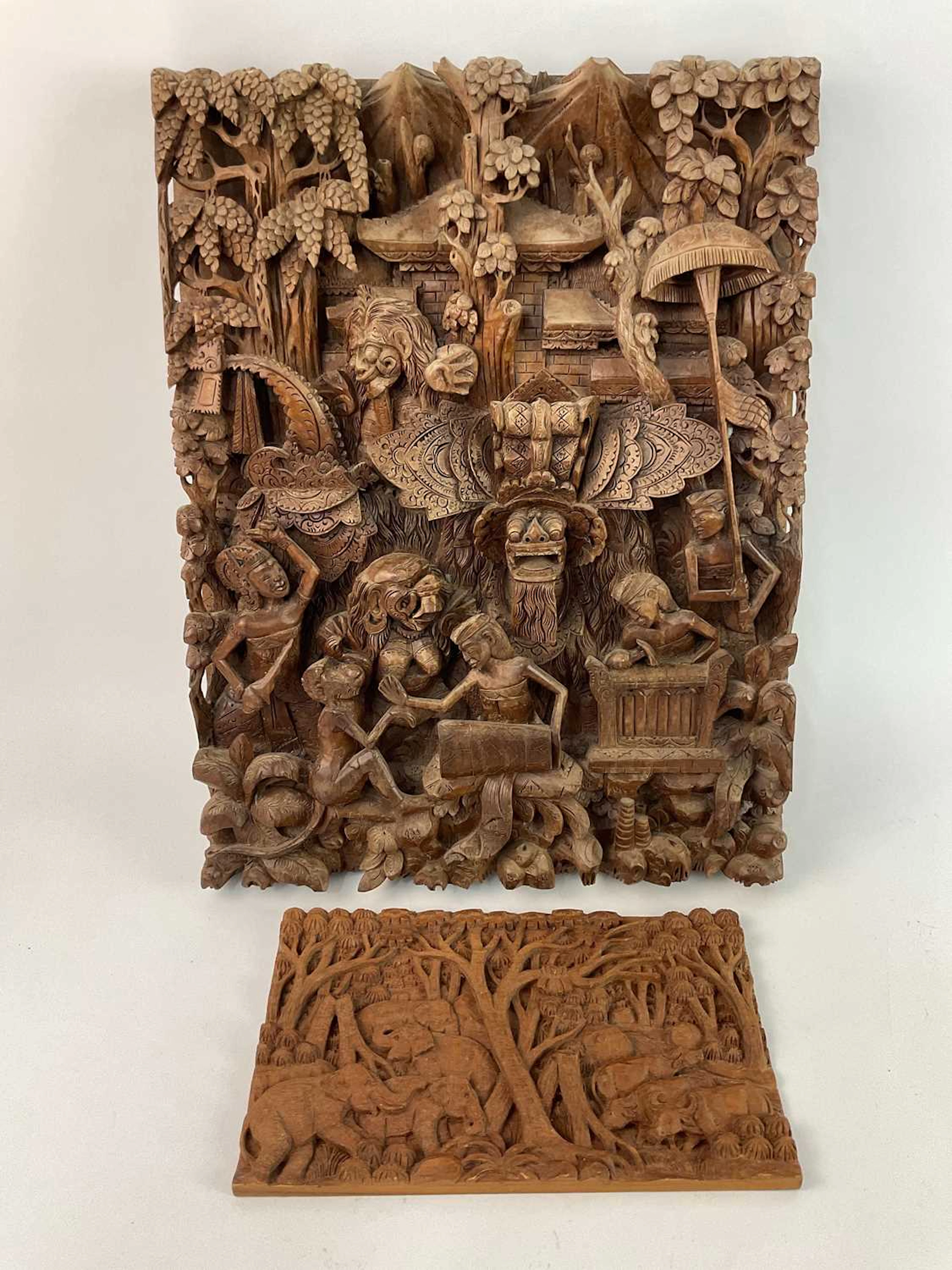 Two Asian mahogany carved panels