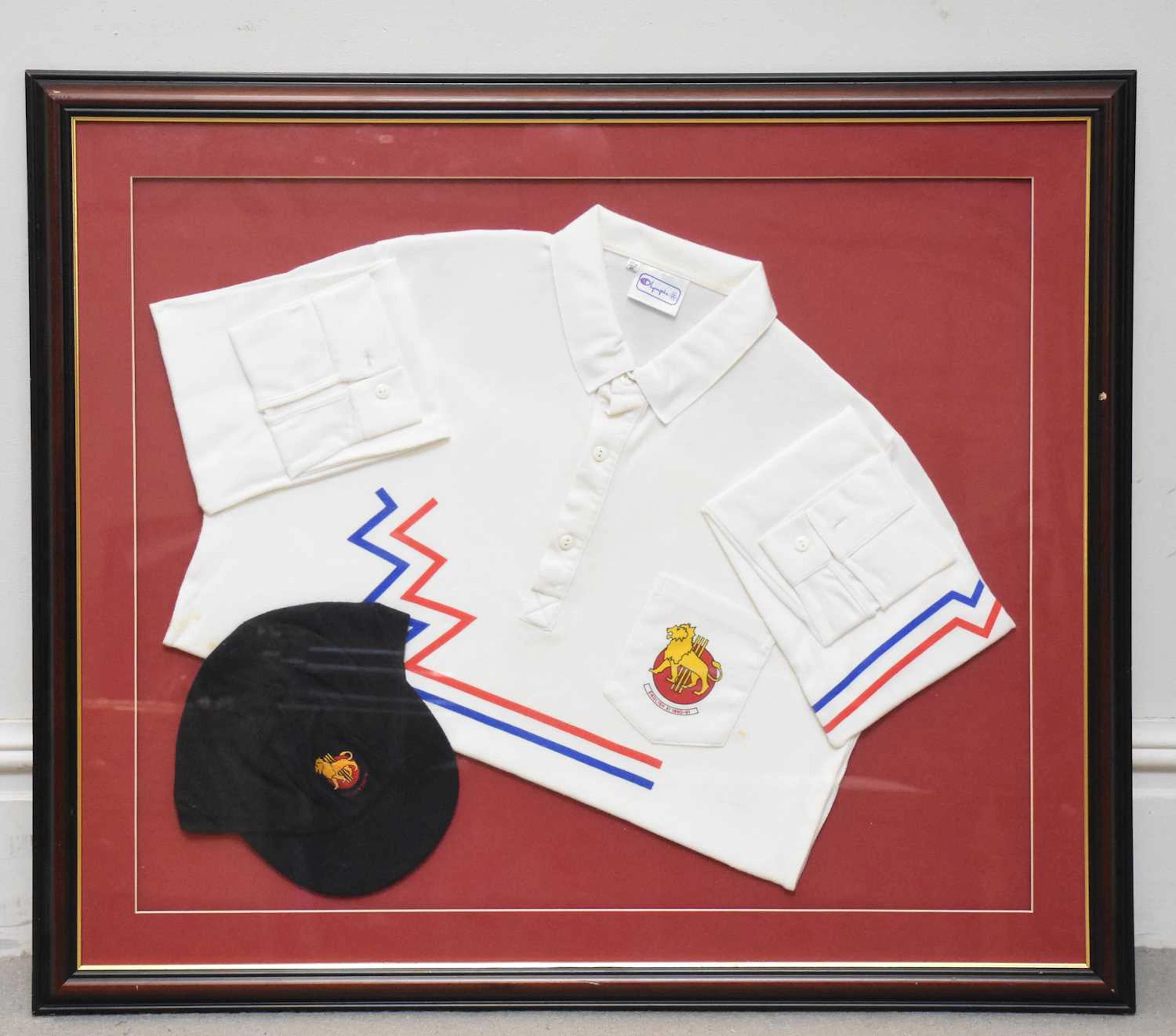 A 1990/91 English XI 'Rebels' tour shirt and cap display