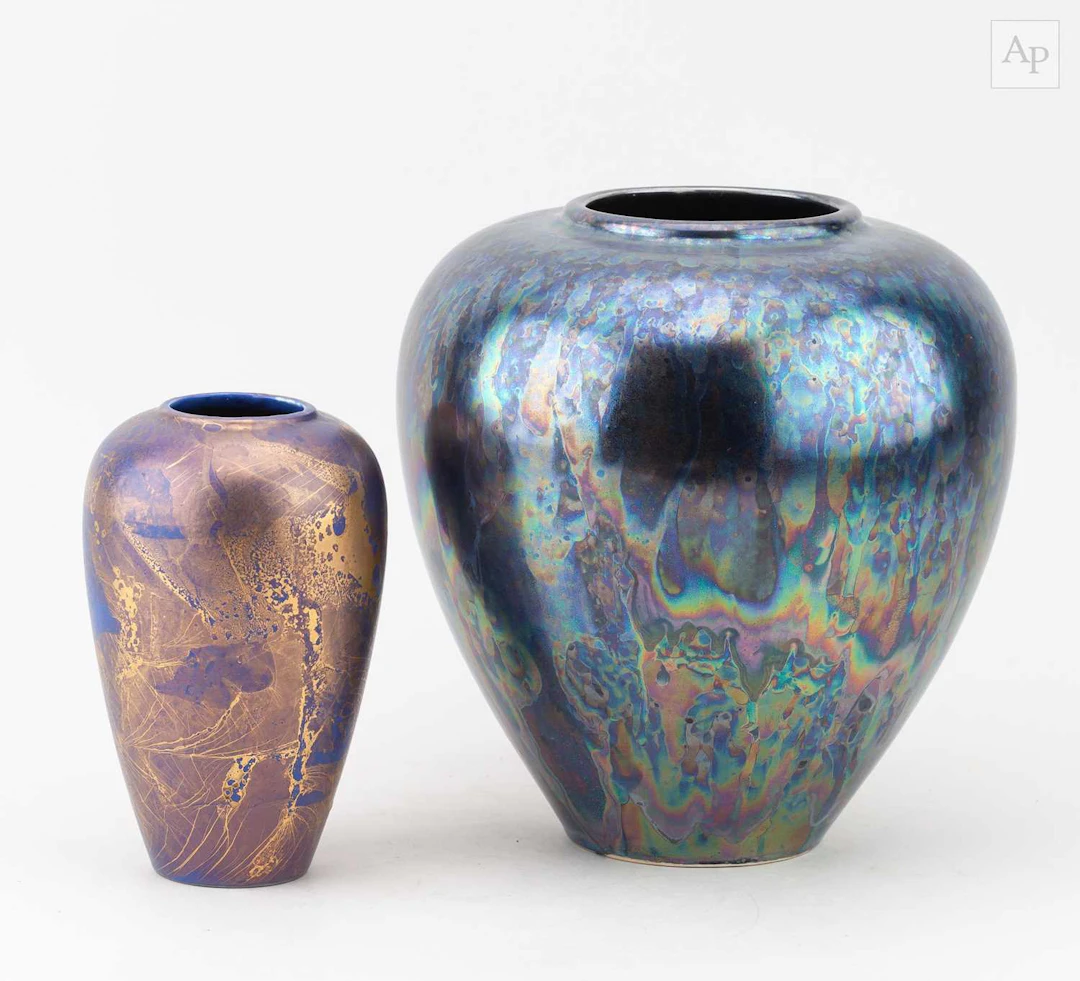 TONY LAVERICK (born 1961); a white porcelain vessel covered in polychrome glaze