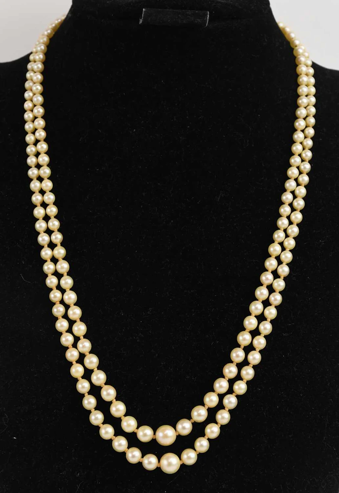 A cultured pearl double strand bead necklace