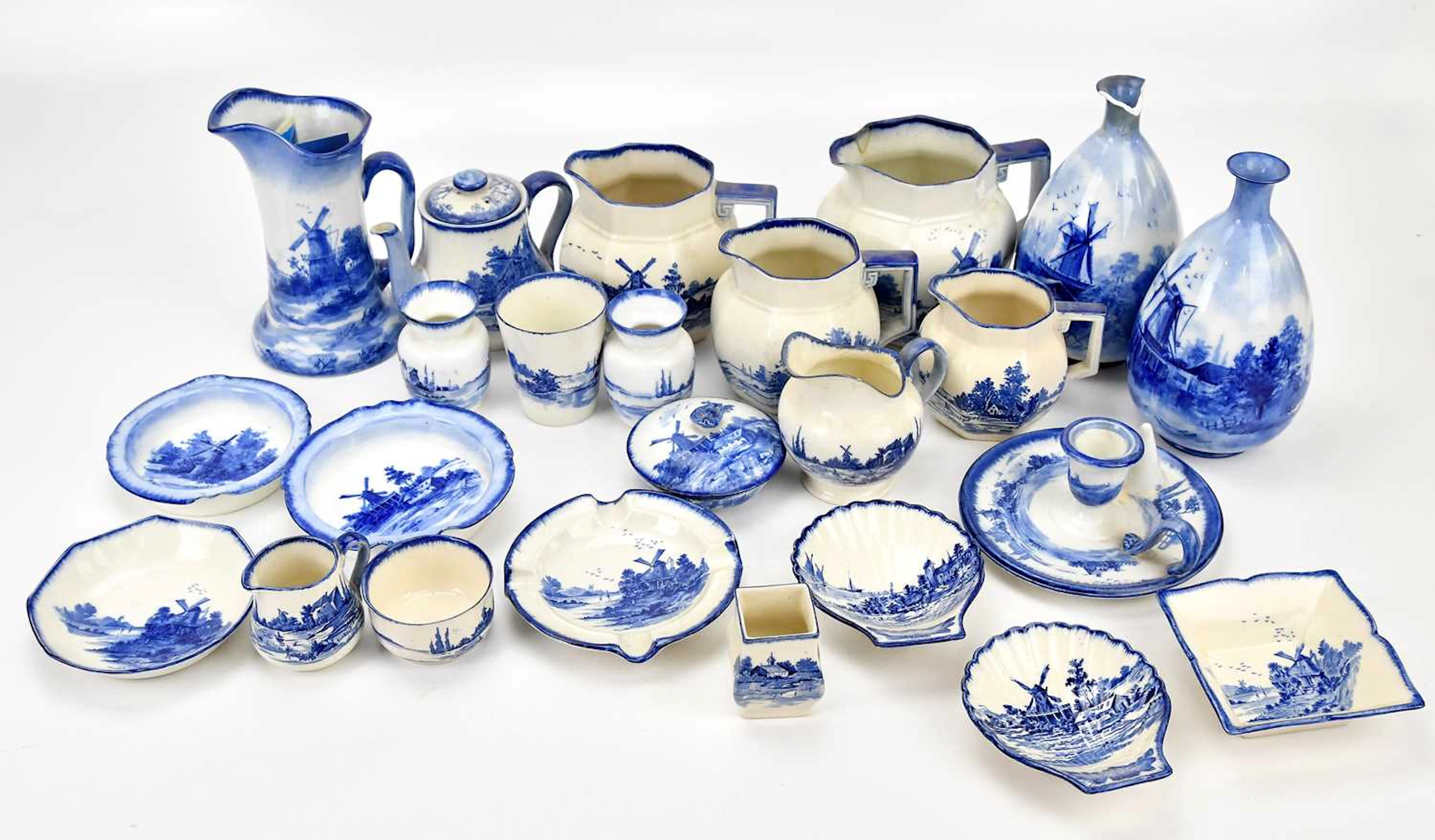 DOULTON BURSLEM; a pair of Norfolk pattern blue and white vases