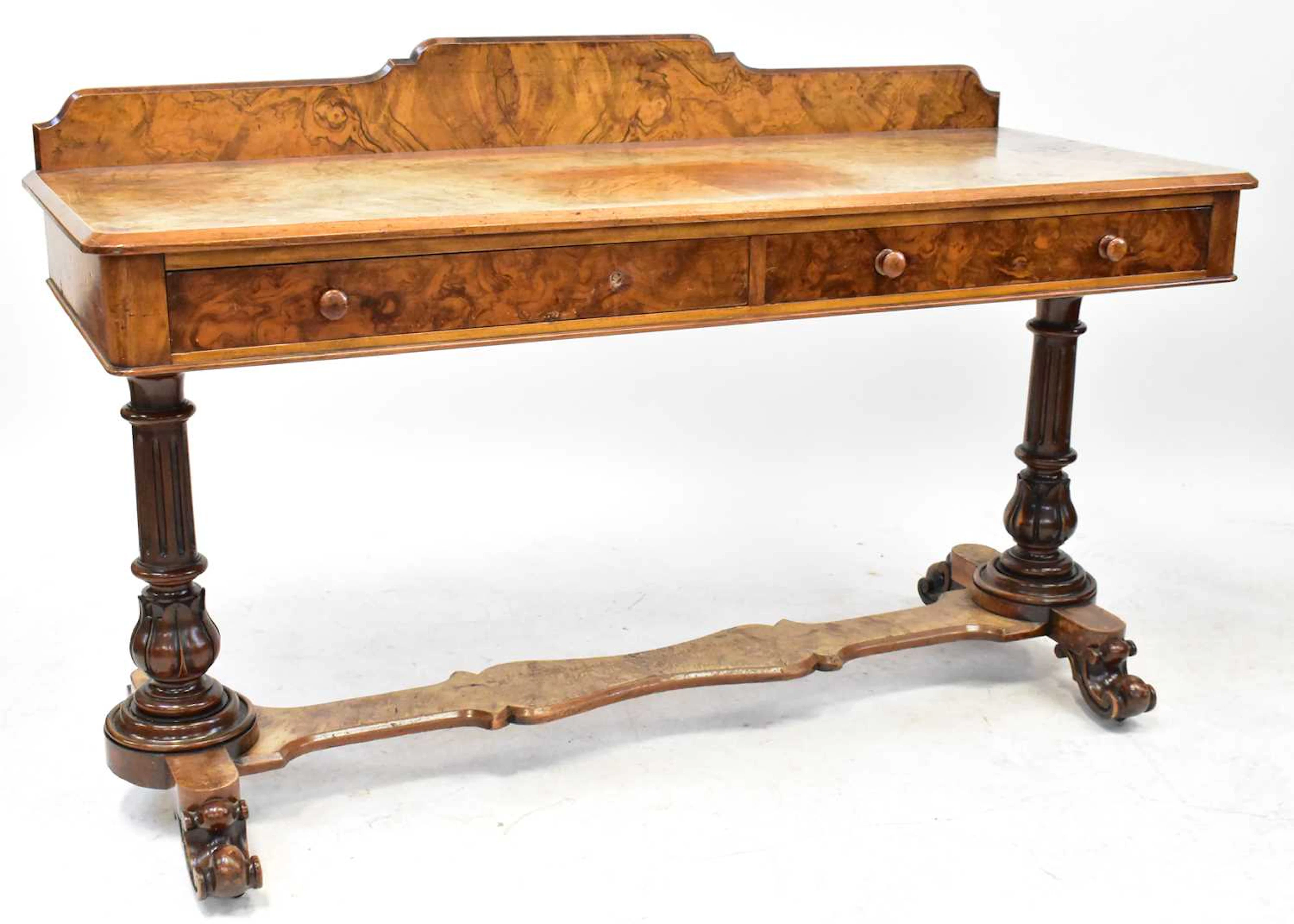 A Victorian figured walnut side table