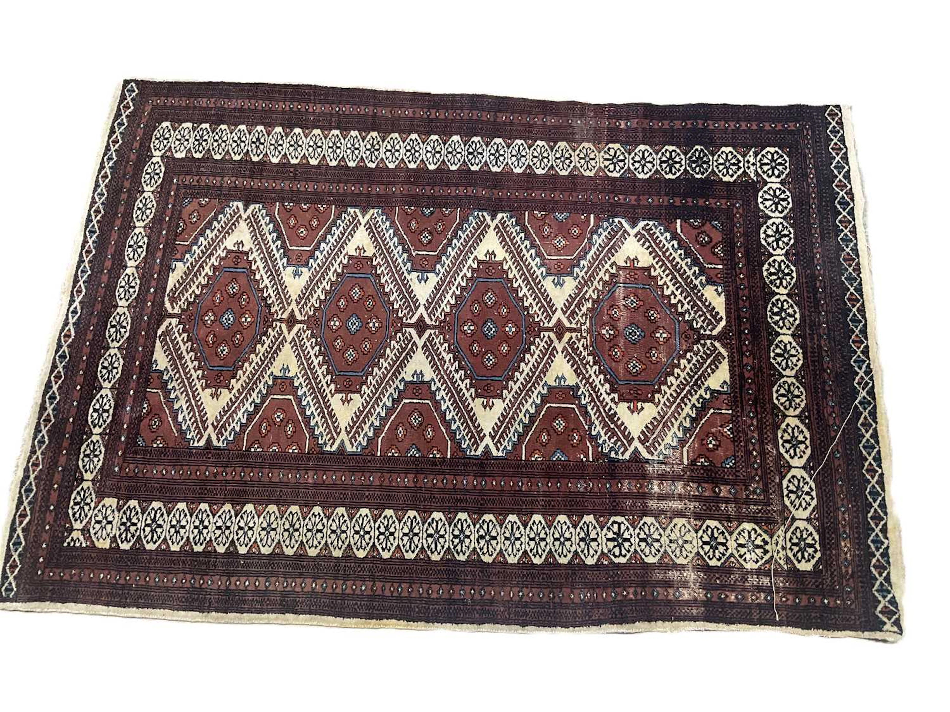 A machine woven Eastern style rug