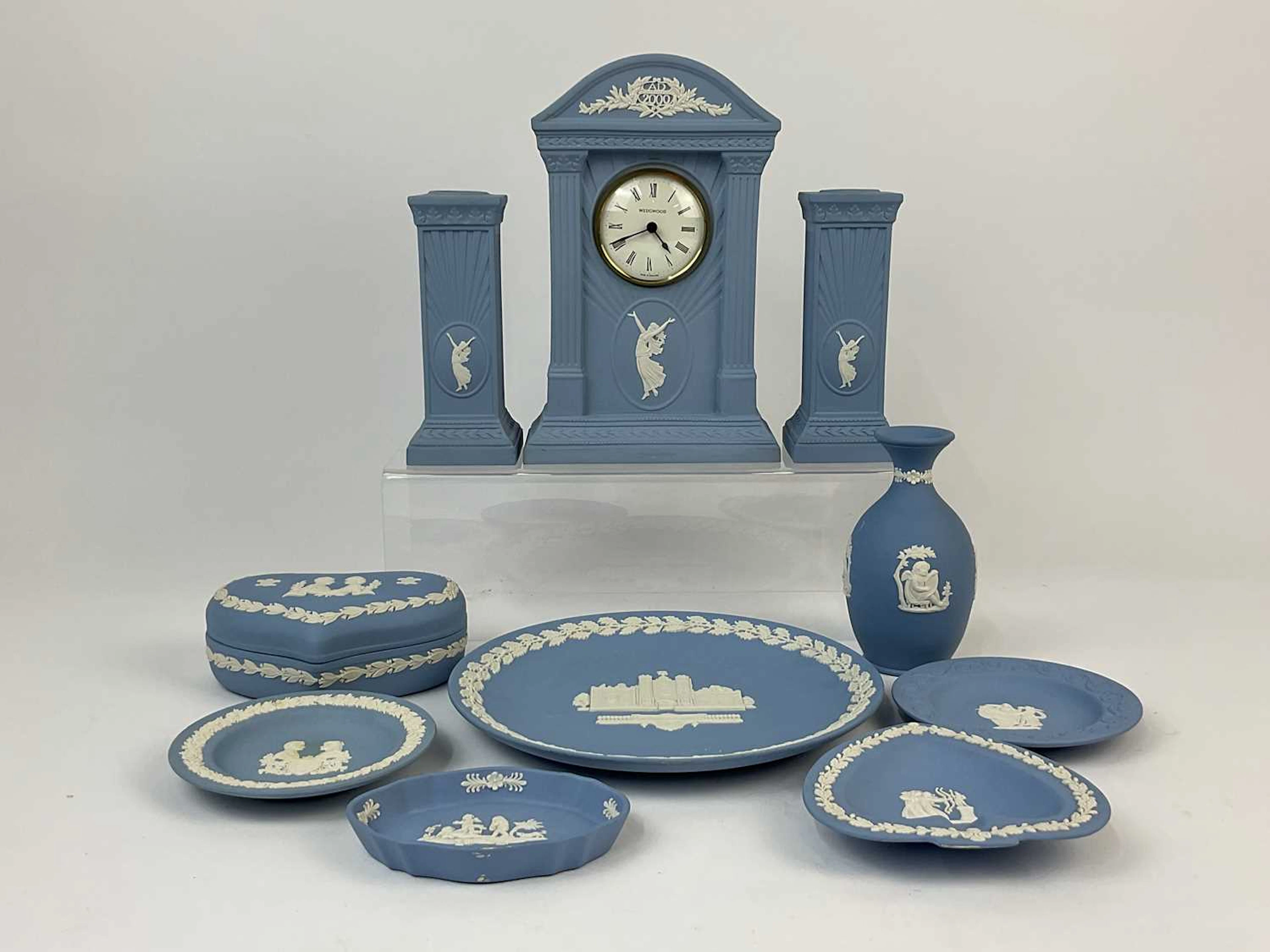 WEDGWOOD; jasperware comprising 'The Millennium Clock' and matching candlesticks