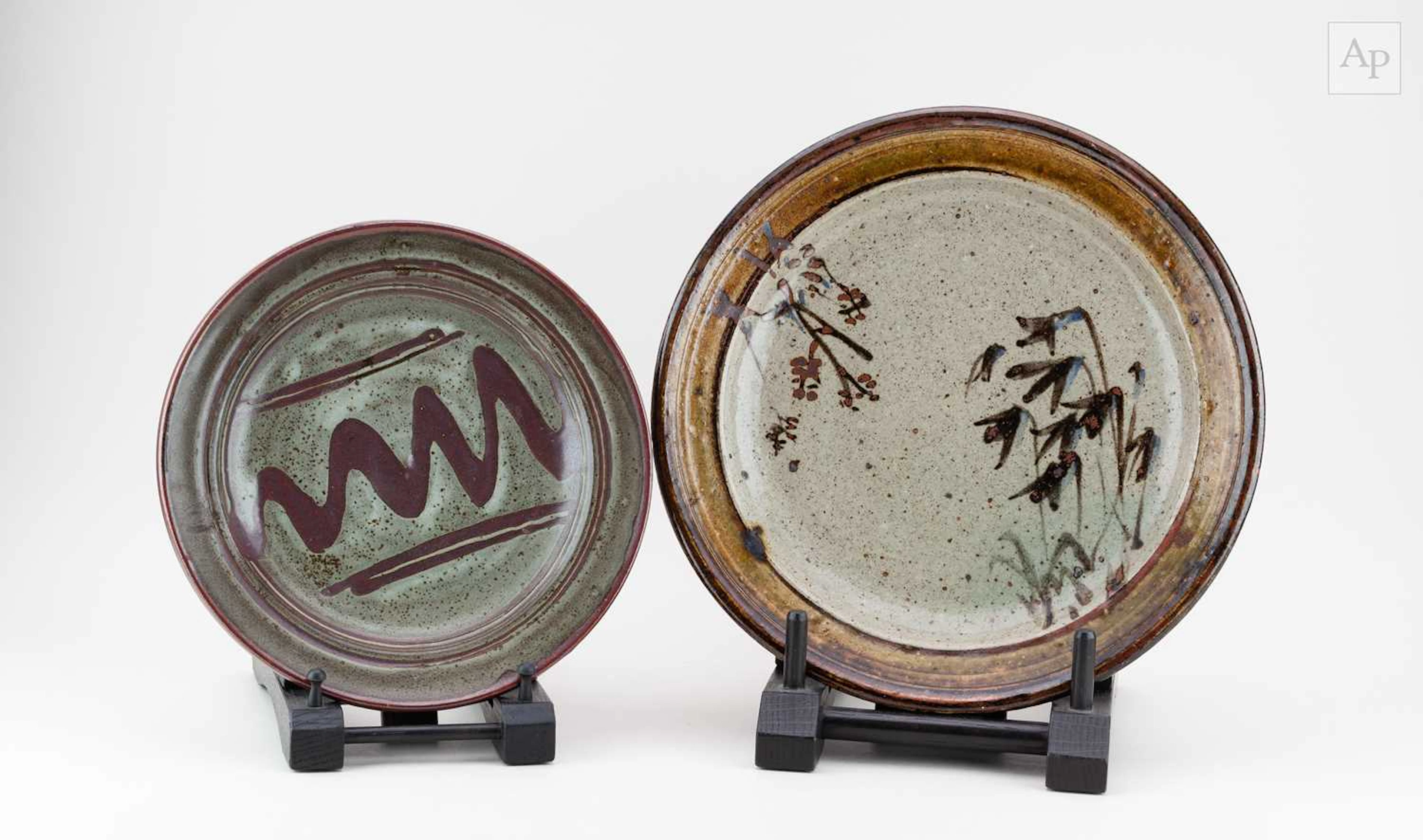 FRANK SMITH (1927-1994); a stoneware charger partially...