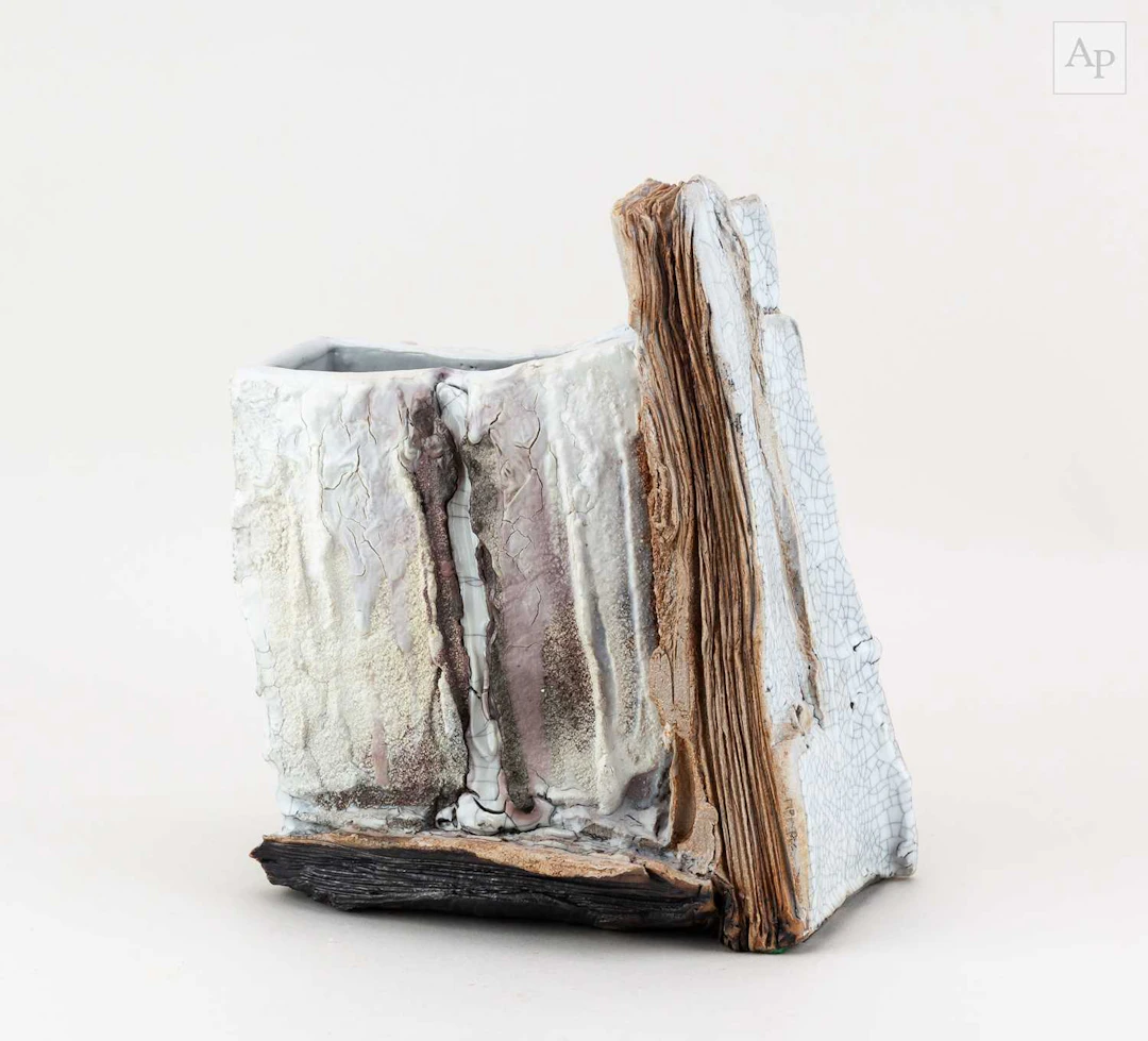 EDDIE CURTIS (born 1953); a kurinuki sculptural stoneware...