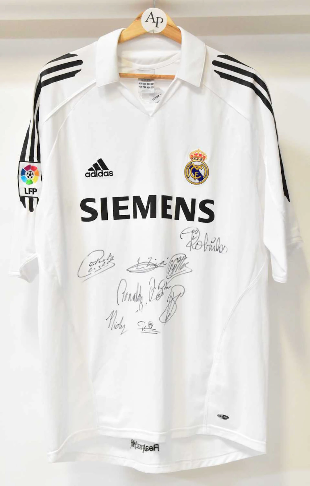 REAL MADRID; a signed team football shirt