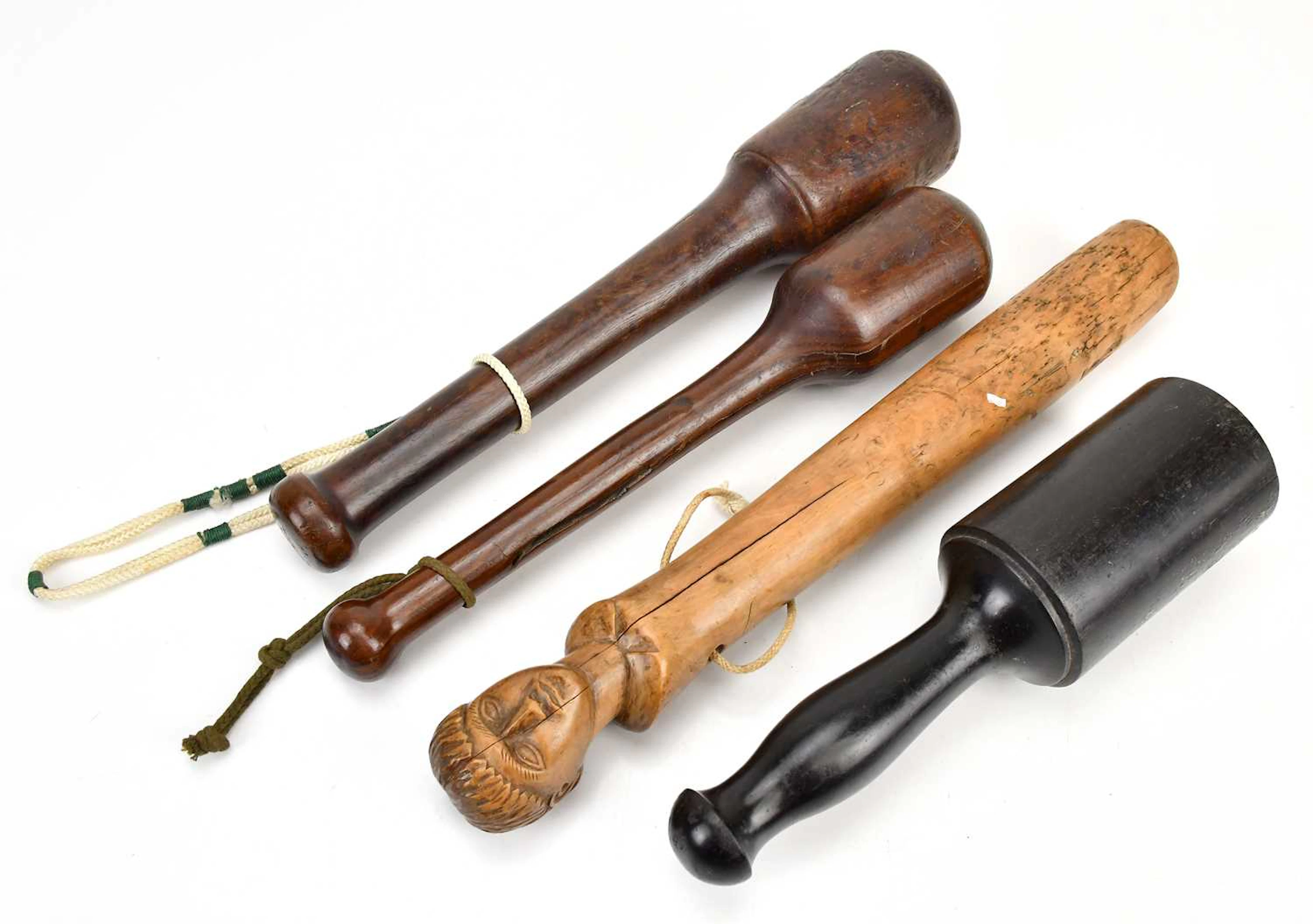 A Continental carved treen truncheon