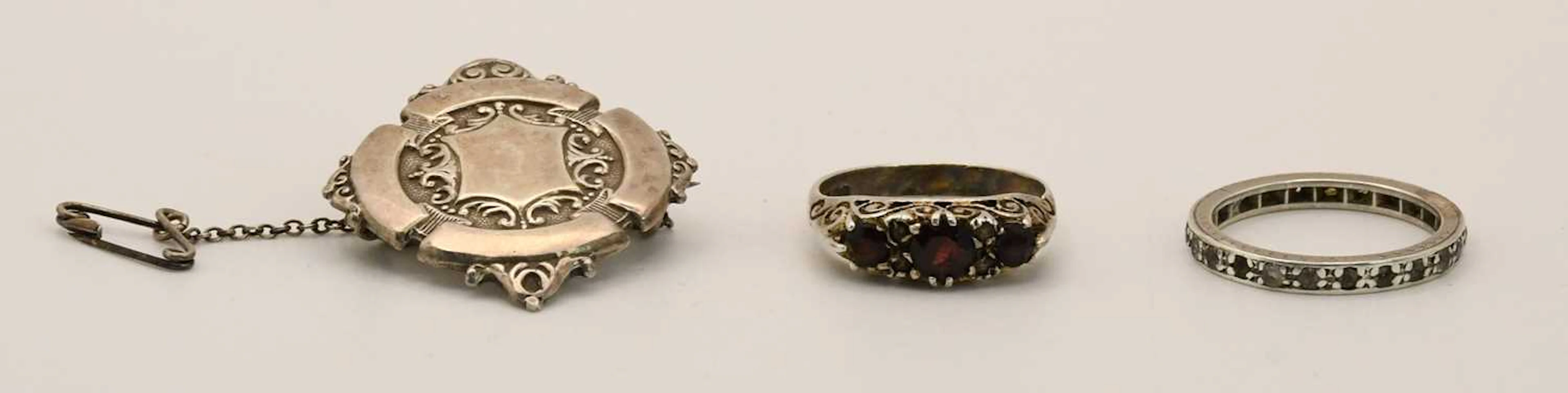 A hallmarked silver prize fob shield brooch