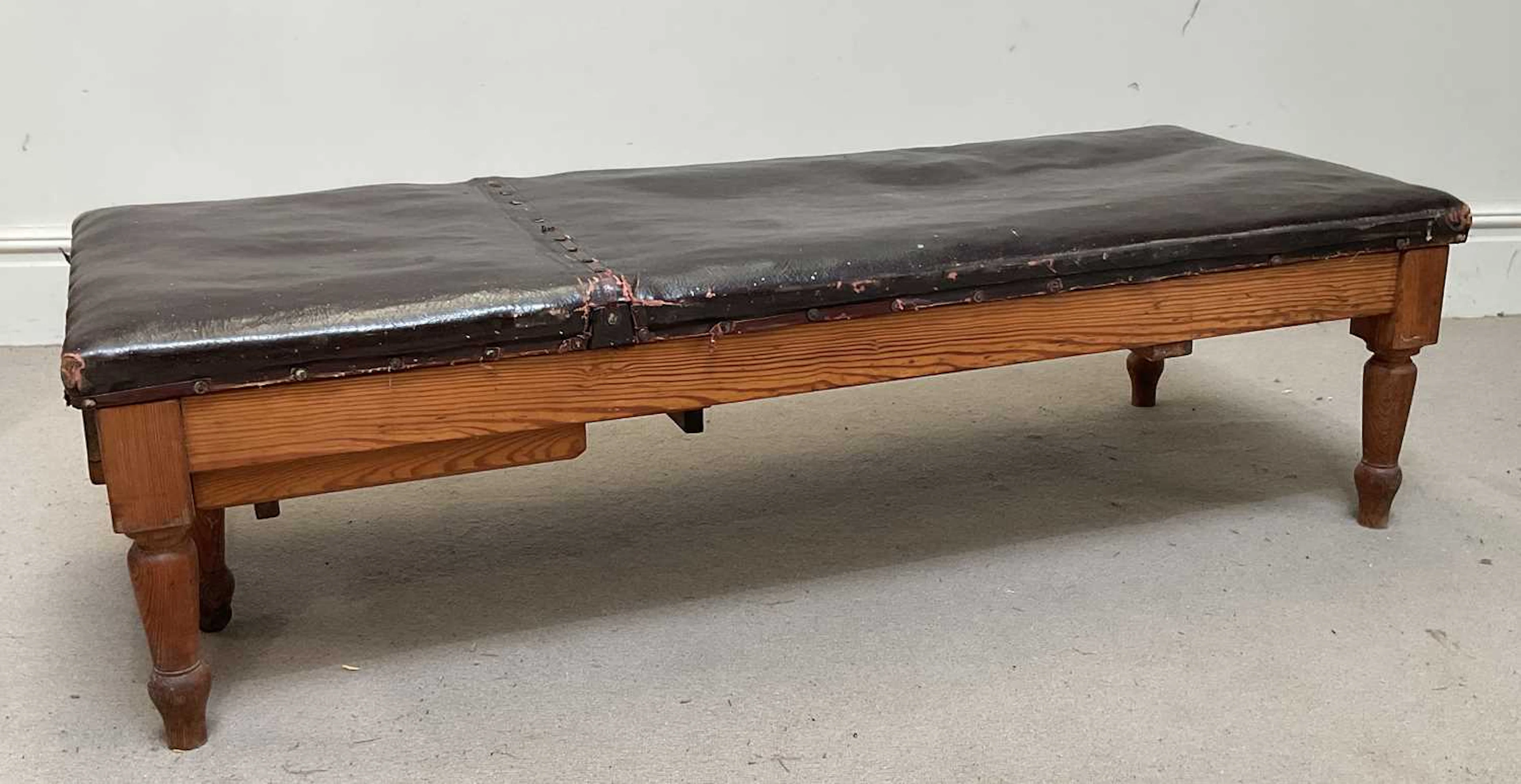 A doctor's pitch pine examination bed