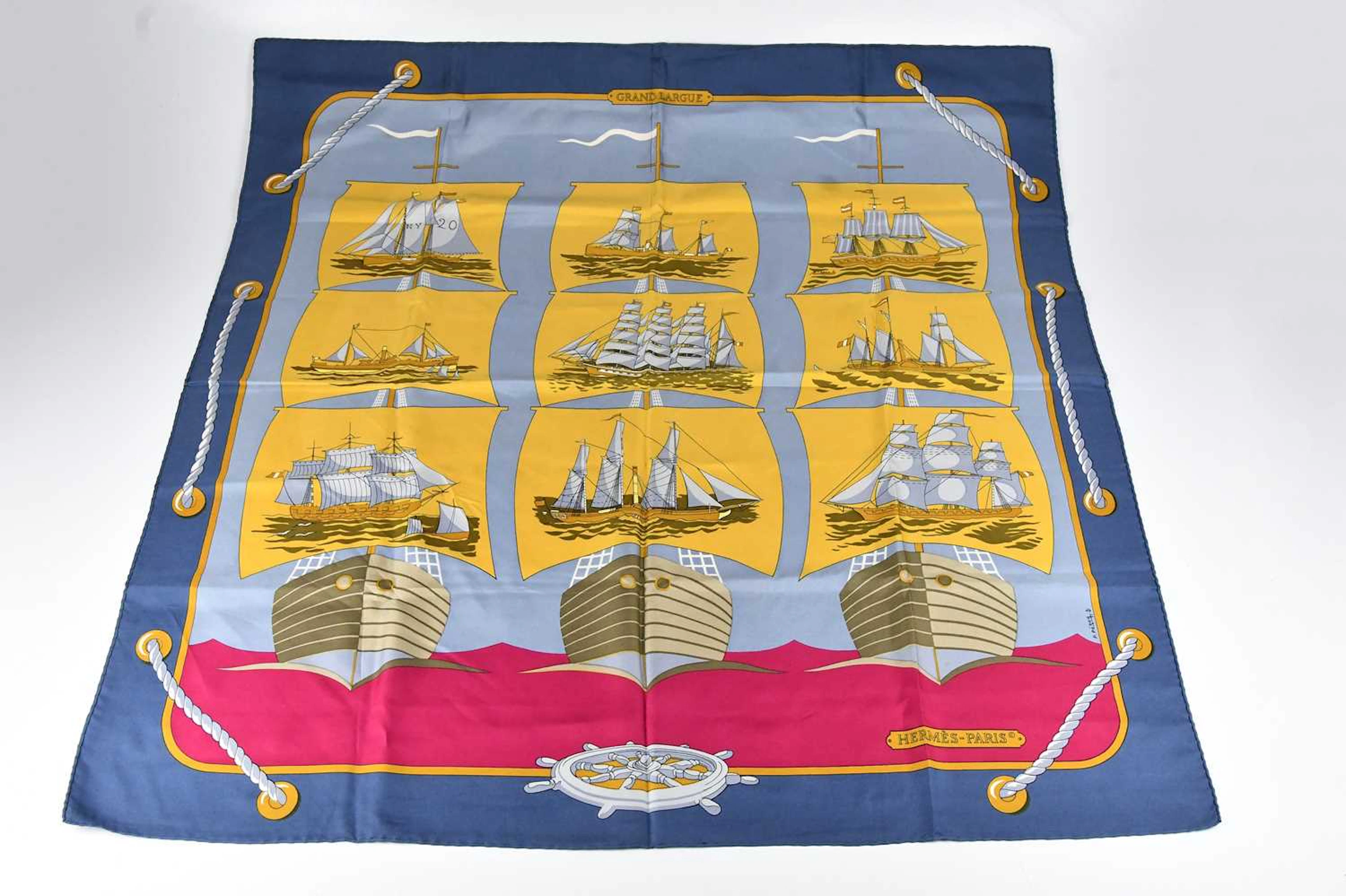 HERMÈS; a 100% silk twill blue